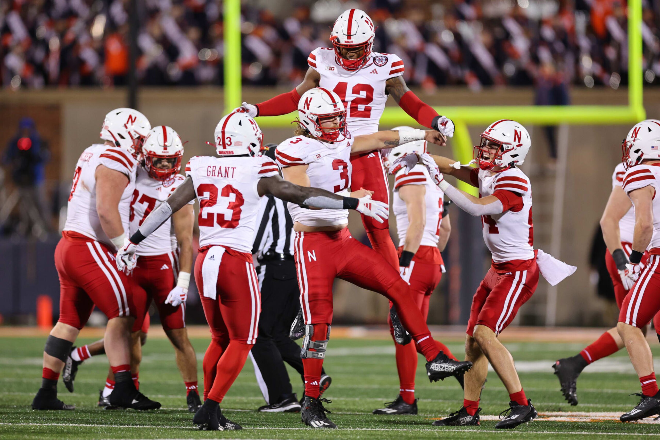 CHAMPAIGN, ILLINOIS - OCTOBER 06: Nick Henrich #3 of the Nebraska Cornhuskers celebrates a stop on fourth down against the Illinois Fighting Illini during the second half at Memorial Stadium on October 06, 2023 in Champaign, Illinois. (Photo by Michael Reaves/Getty Images)