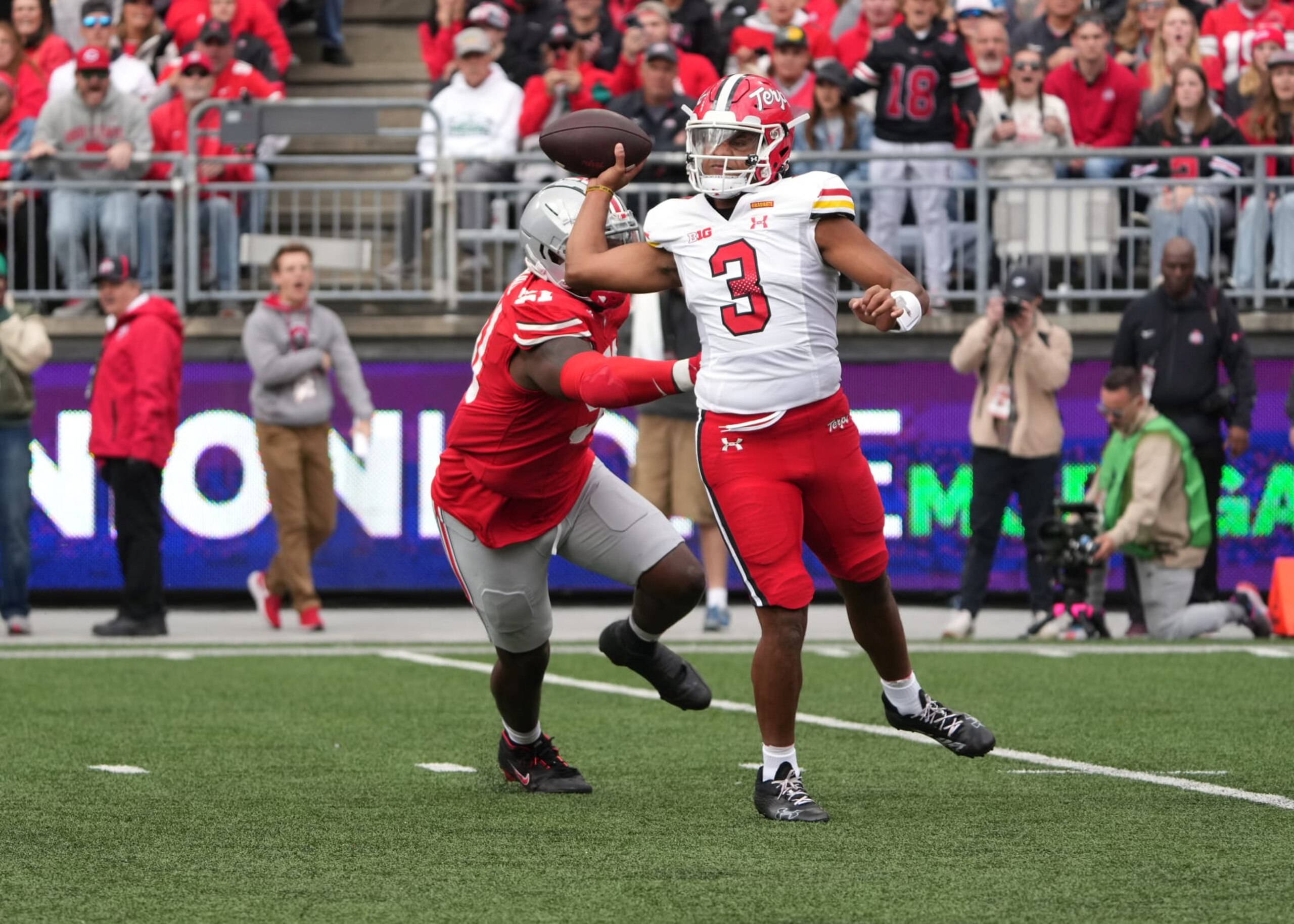COLUMBUS, OH - OCTOBER 07: Taulia Tagovailoa #3 of the Maryland Terrapins passes the ball while under pressure during the game against the Ohio State Buckeyes at Ohio Stadium in Columbus, Ohio on October 7, 2023.(Photo by Jason Mowry/Icon Sportswire via Getty Images)