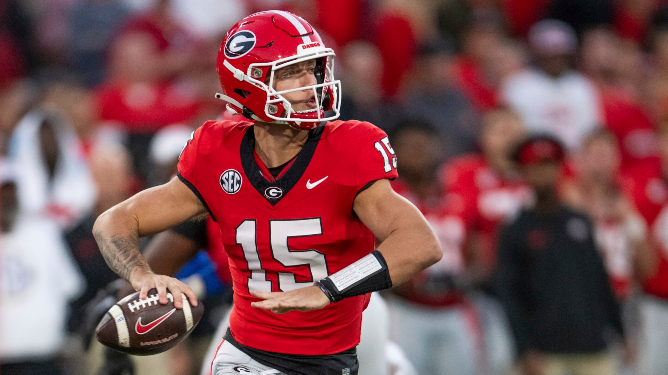 Georgia quarterback Carson Beck looks for a receiver during the first half of the team's NCAA college football game against Kentucky, Saturday, Oct. 7, 2023, in Athens, Ga. (AP Photo/Hakim Wright Sr.)