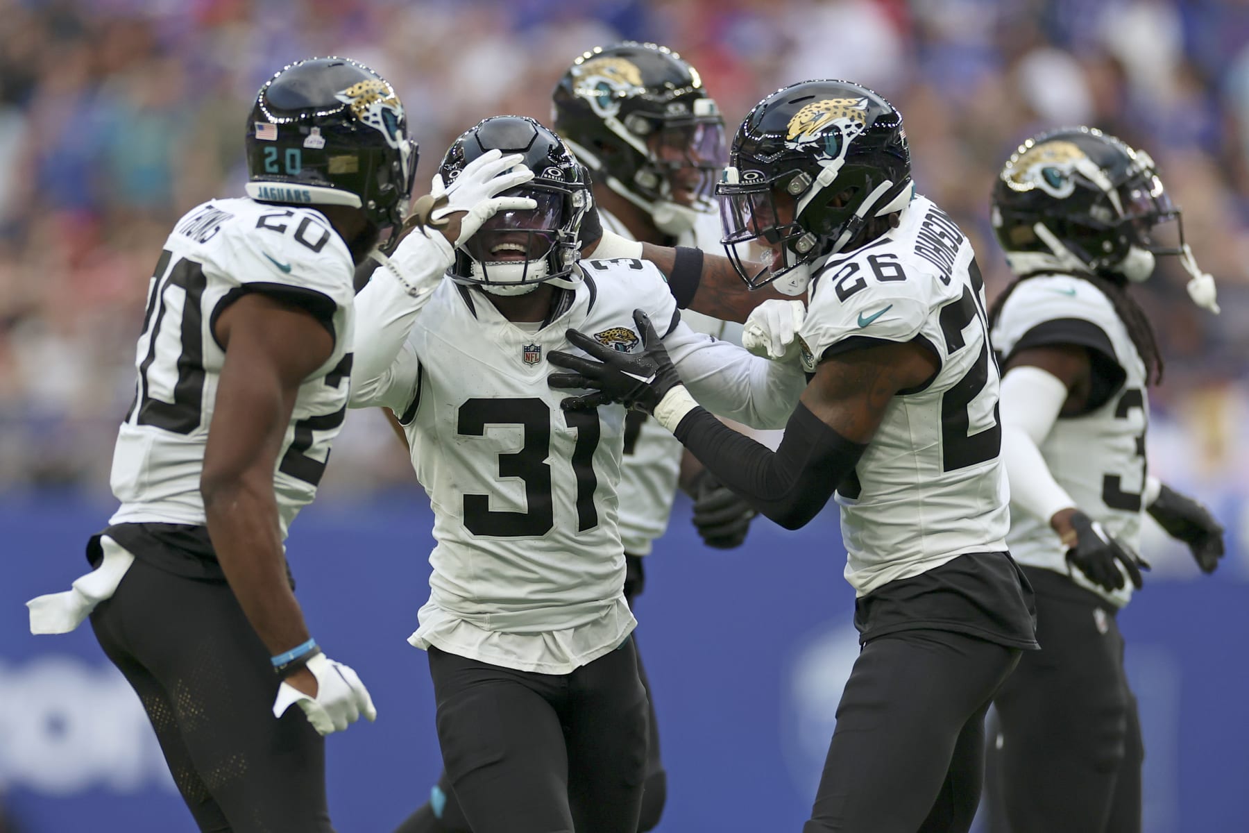 Jacksonville Jaguars cornerback Darious Williams (31) reacts after forcing a turnover during an NFL football game between Jacksonville Jaguars and Buffalo Bills at the Tottenham Hotspur stadium in London, Sunday, Oct. 8, 2023. (AP Photo/Ian Walton)