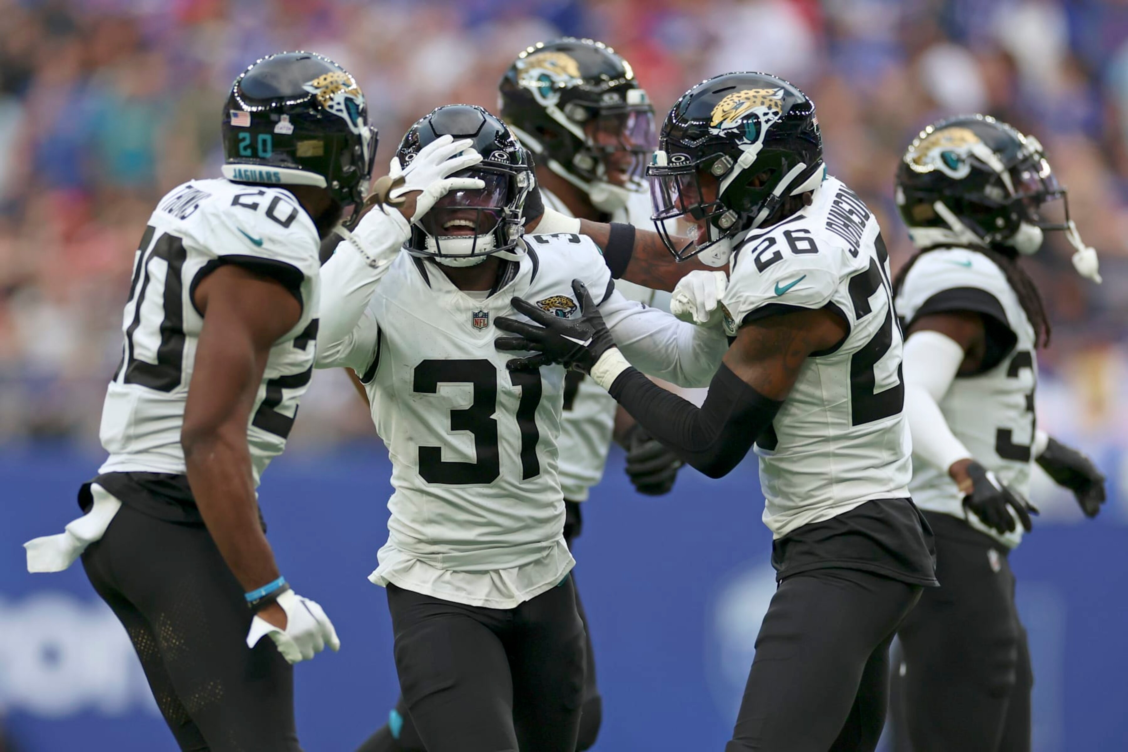 Jacksonville Jaguars cornerback Darious Williams (31) reacts after forcing a turnover during an NFL football game between Jacksonville Jaguars and Buffalo Bills at the Tottenham Hotspur stadium in London, Sunday, Oct. 8, 2023. (AP Photo/Ian Walton)