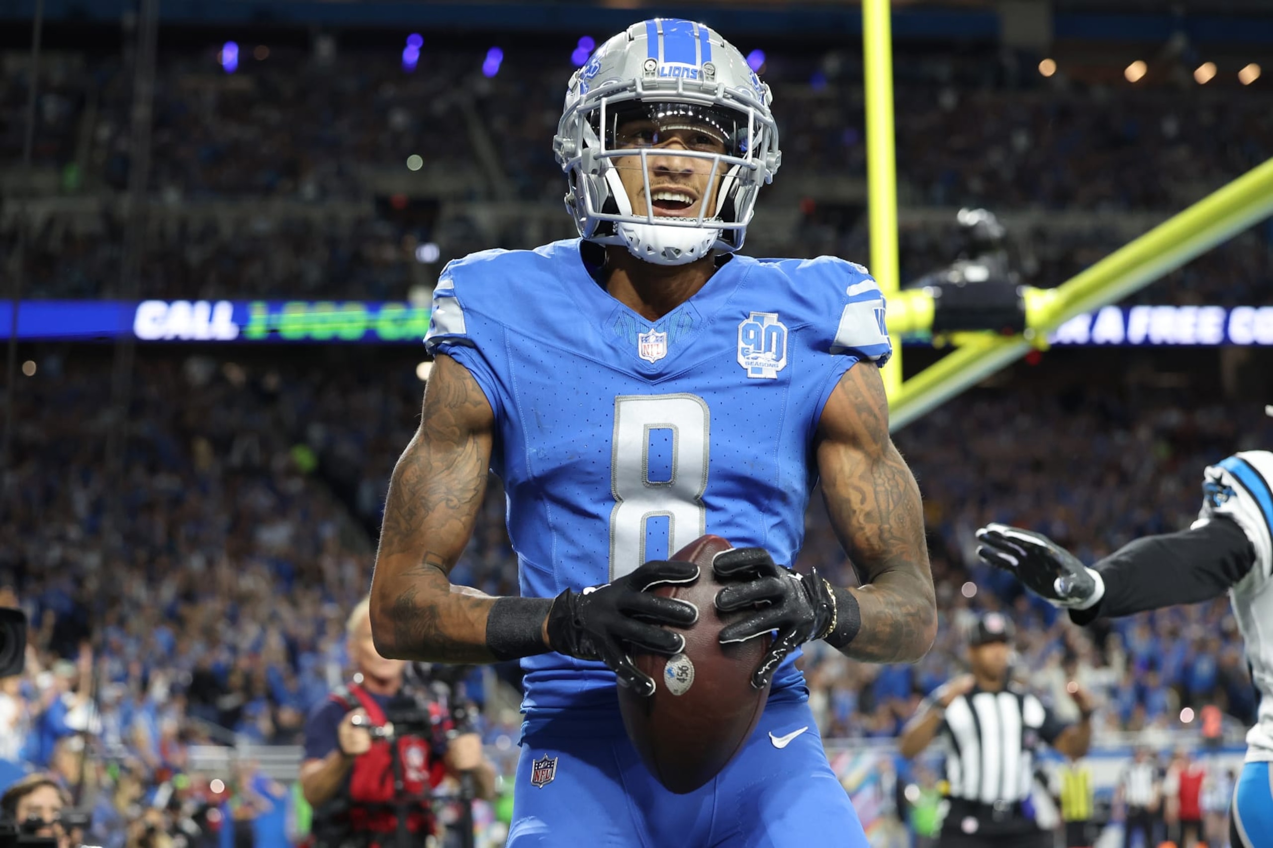 DETROIT, MICHIGAN - OCTOBER 08: Josh Reynolds #8 of the Detroit Lions celebrates after scoring a touchdown in the second quarter against the Carolina Panthers at Ford Field on October 08, 2023 in Detroit, Michigan. (Photo by Rey Del Rio/Getty Images) DETROIT, MICHIGAN - OCTOBER 08: Josh Reynolds #8 of the Detroit Lions celebrates after scoring a touchdown in the second quarter against the Carolina Panthers at Ford Field on October 08, 2023 in Detroit, Michigan. (Photo by Rey Del Rio/Getty Images)