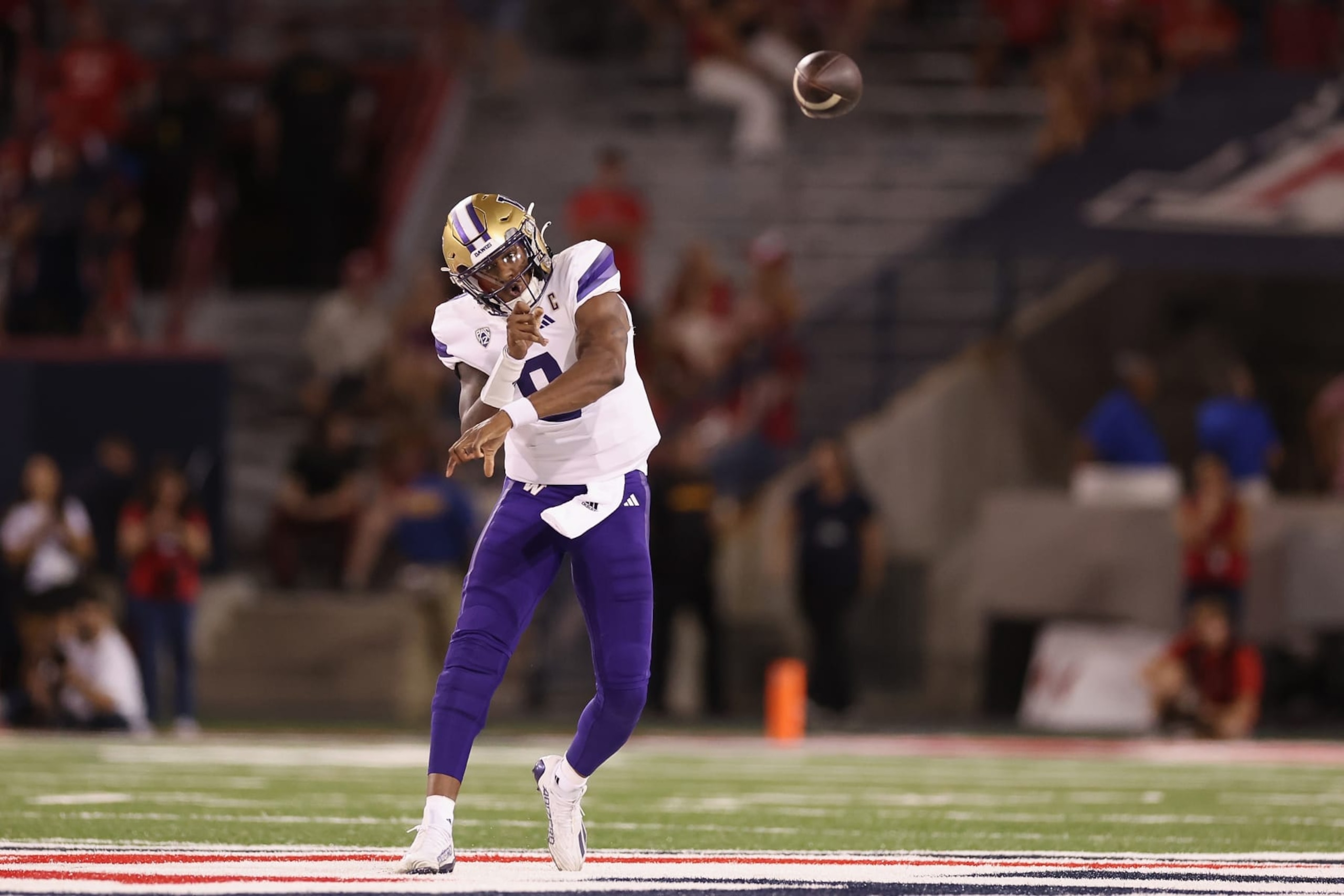 TUCSON, ARIZONA - SEPTEMBER 30: Quarterback Michael Penix Jr. #9 of the Washington Huskies throws a pass during the second half of the NCAAF game against the Arizona Wildcats at Arizona Stadium on September 30, 2023 in Tucson, Arizona. (Photo by Christian Petersen/Getty Images)