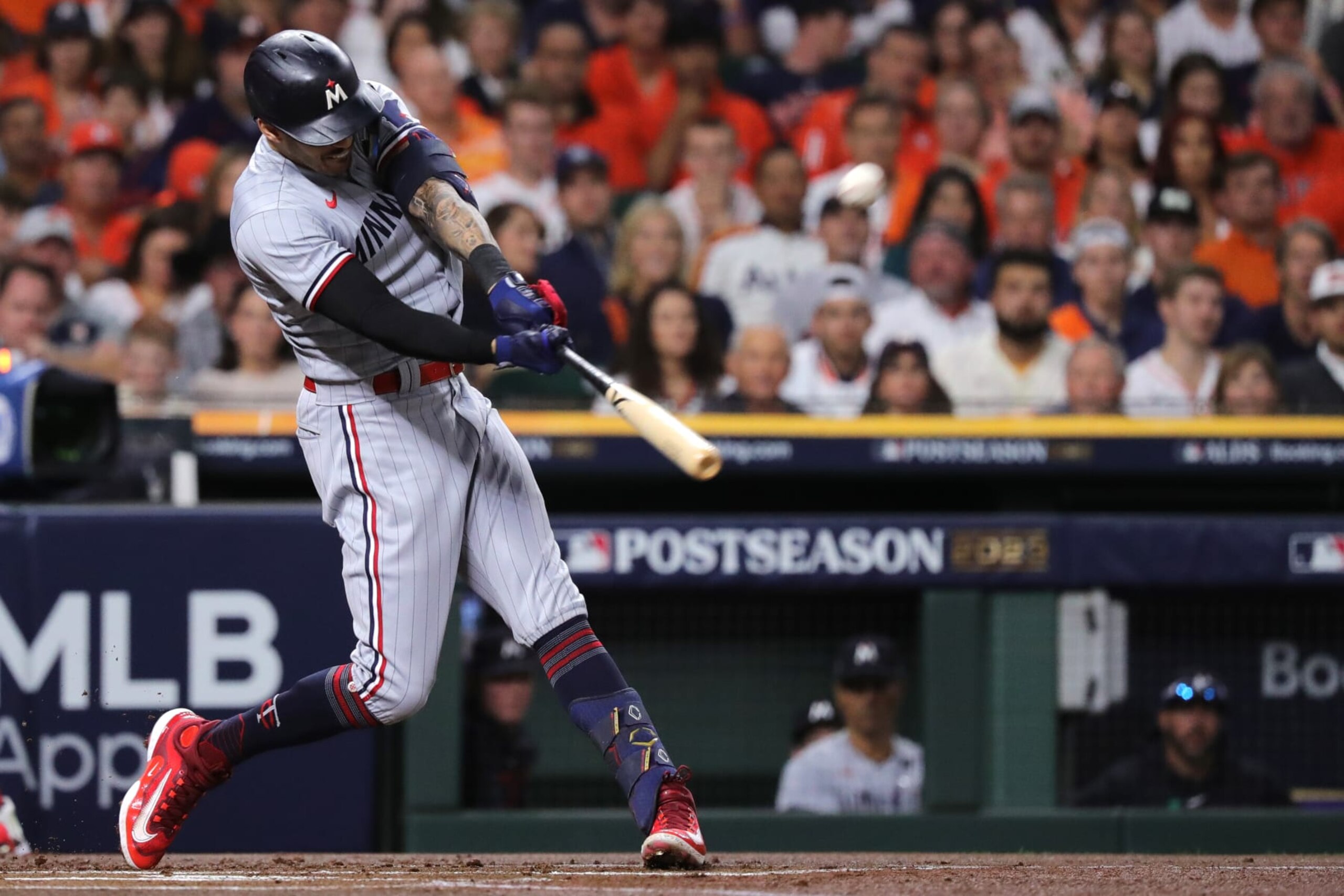 HOUSTON, TEXAS - OCTOBER 08: Carlos Correa #4 of the Minnesota Twins hits an RBI double against the Houston Astros during the first inning in Game Two of the Division Series at Minute Maid Park on October 08, 2023 in Houston, Texas. (Photo by Bob Levey/Getty Images) HOUSTON, TEXAS - OCTOBER 08: Carlos Correa #4 of the Minnesota Twins hits an RBI double against the Houston Astros during the first inning in Game Two of the Division Series at Minute Maid Park on October 08, 2023 in Houston, Texas. (Photo by Bob Levey/Getty Images)