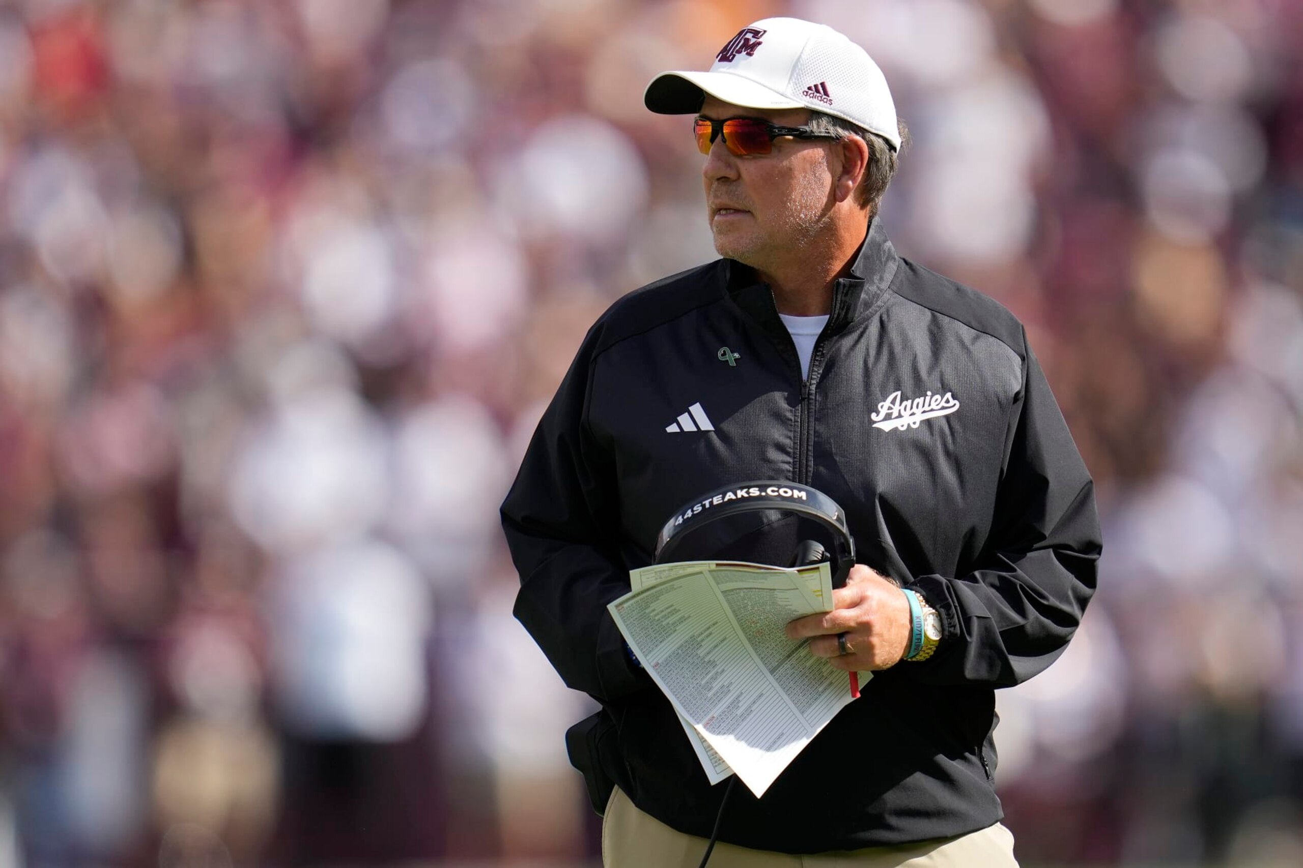 Texas A&M head coach Jimbo Fisher reacts to a call against his offense during the first half of an NCAA college football game against Alabama Saturday, Oct. 7, 2023, in College Station, Texas. (AP Photo/Sam Craft) Texas A&M head coach Jimbo Fisher reacts to a call against his offense during the first half of an NCAA college football game against Alabama Saturday, Oct. 7, 2023, in College Station, Texas. (AP Photo/Sam Craft)
