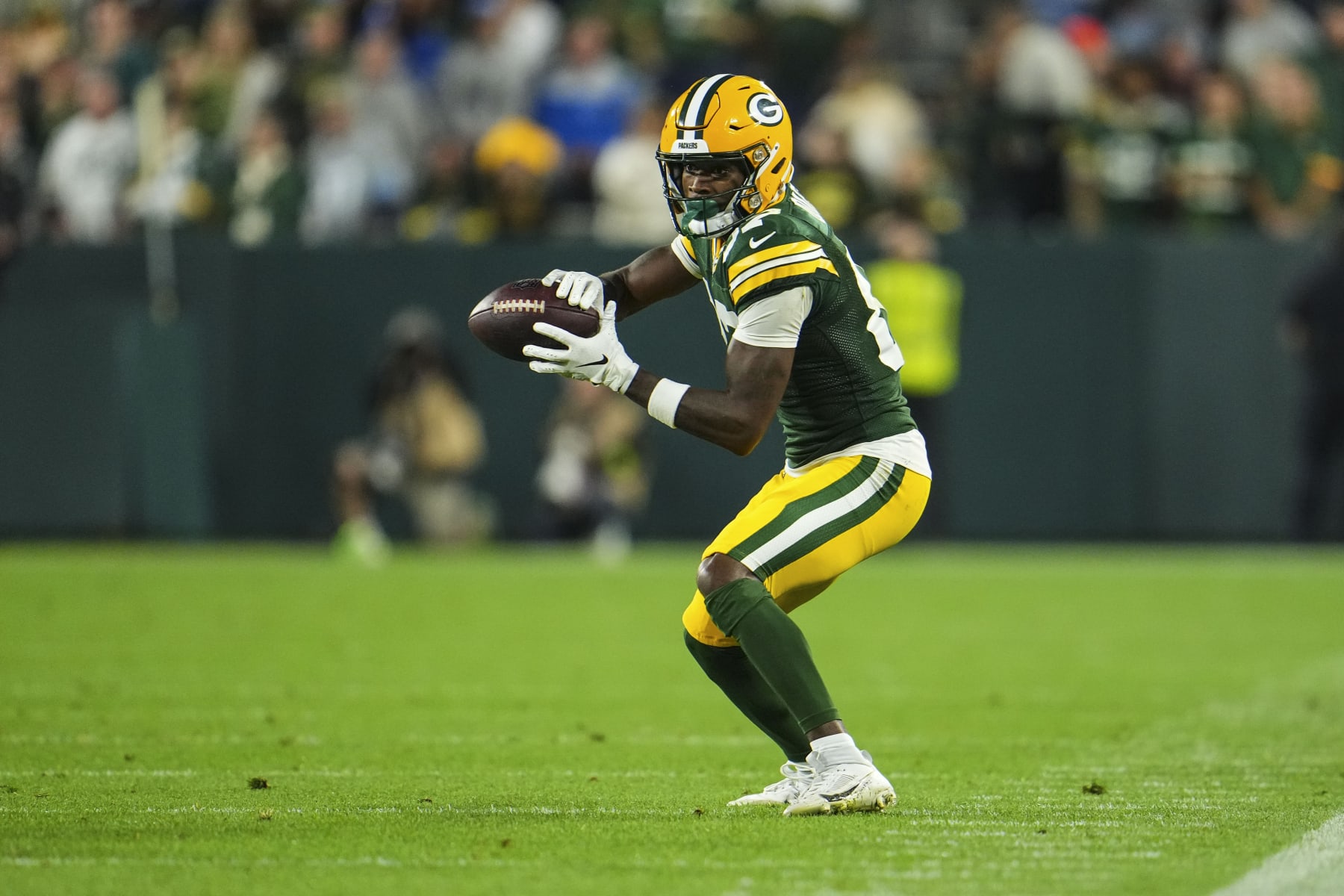 GREEN BAY, WI - SEPTEMBER 28: Romeo Doubs #87 of the Green Bay Packers makes a catch during an NFL football game at Lambeau Field on September 28, 2023 in Green Bay, Wisconsin. (Photo by Cooper Neill/Getty Images)