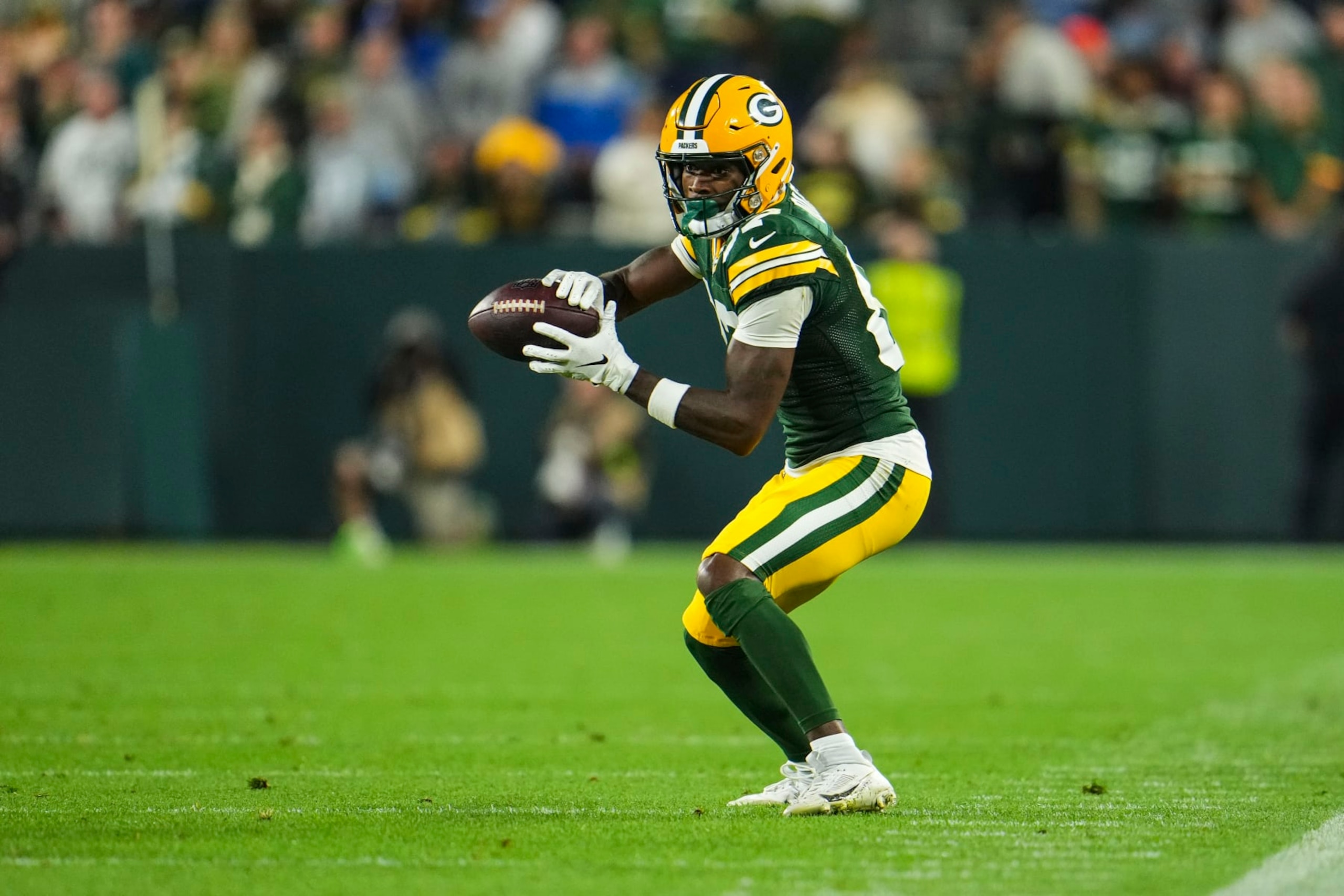 GREEN BAY, WI - SEPTEMBER 28: Romeo Doubs #87 of the Green Bay Packers makes a catch during an NFL football game at Lambeau Field on September 28, 2023 in Green Bay, Wisconsin. (Photo by Cooper Neill/Getty Images)