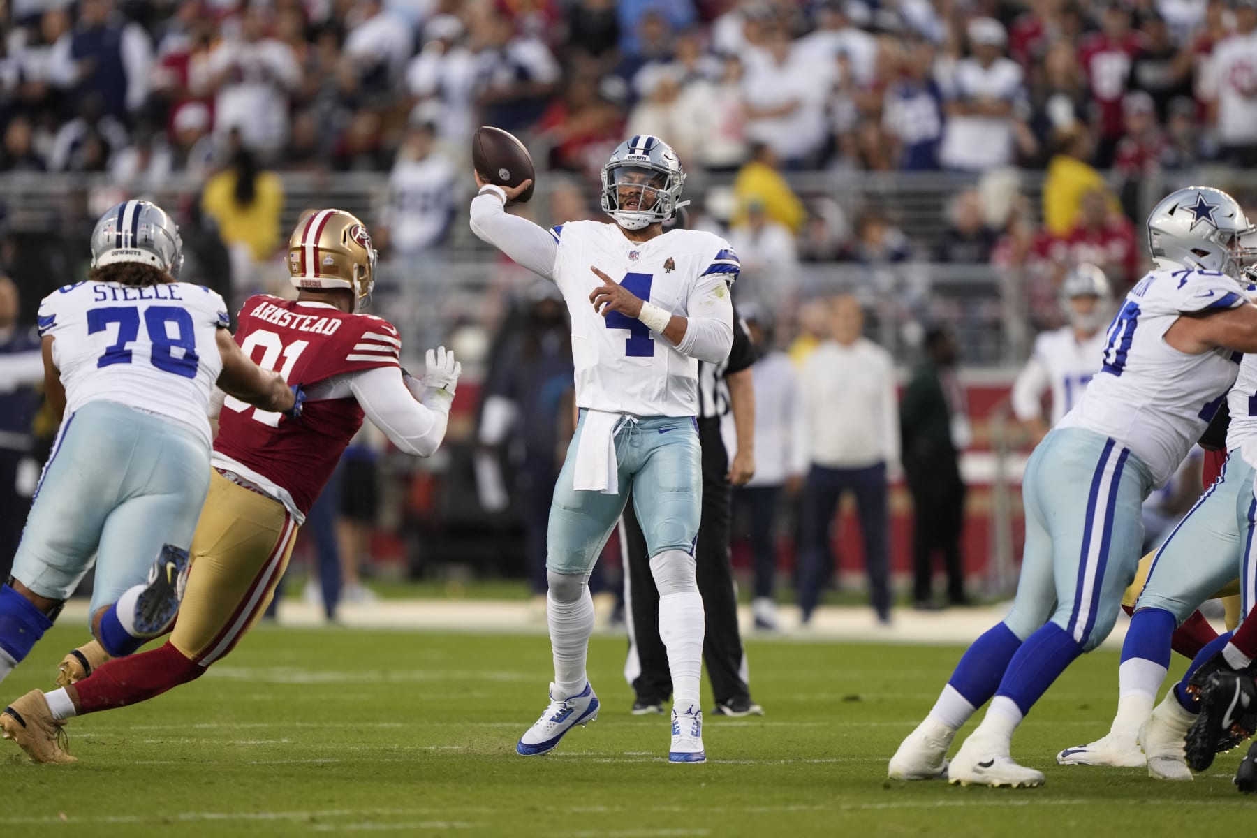 SANTA CLARA, CALIFORNIA - OCTOBER 08: Dak Prescott #4 of the Dallas Cowboys throws a touchdown pass to KaVontae Turpin #9 during the second quarter against the San Francisco 49ers at Levi's Stadium on October 08, 2023 in Santa Clara, California. (Photo by Thearon W. Henderson/Getty Images)