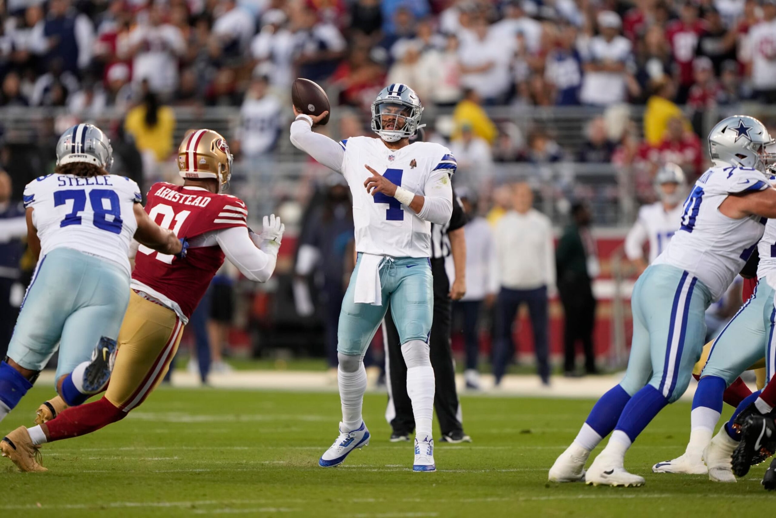 SANTA CLARA, CALIFORNIA - OCTOBER 08: Dak Prescott #4 of the Dallas Cowboys throws a touchdown pass to KaVontae Turpin #9 during the second quarter against the San Francisco 49ers at Levi's Stadium on October 08, 2023 in Santa Clara, California. (Photo by Thearon W. Henderson/Getty Images) SANTA CLARA, CALIFORNIA - OCTOBER 08: Dak Prescott #4 of the Dallas Cowboys throws a touchdown pass to KaVontae Turpin #9 during the second quarter against the San Francisco 49ers at Levi's Stadium on October 08, 2023 in Santa Clara, California. (Photo by Thearon W. Henderson/Getty Images)