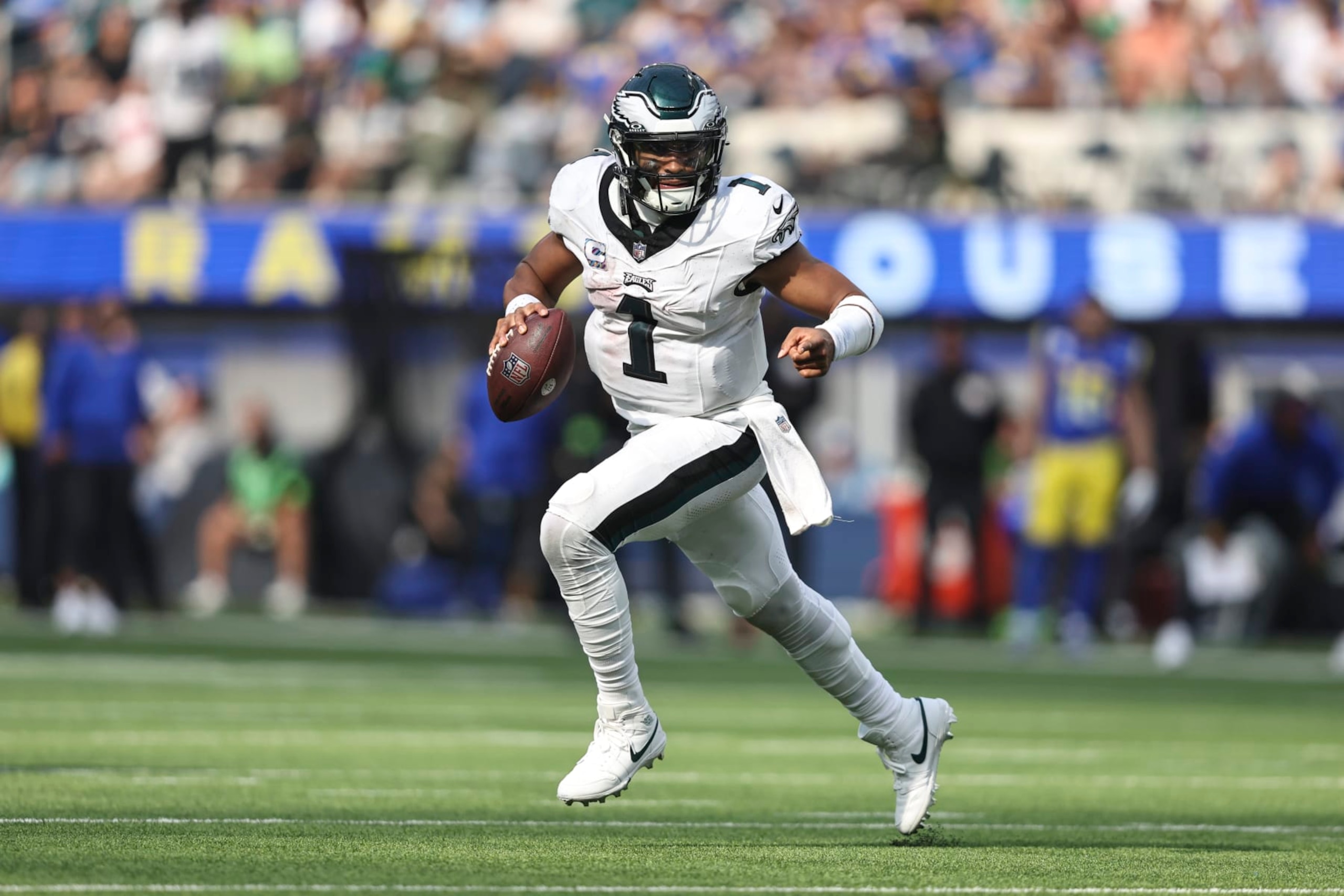 INGLEWOOD, CALIFORNIA - OCTOBER 08: Jalen Hurts #1 of the Philadelphia Eagles scrambles and runs with the ball during an NFL football game between the Los Angeles Rams and the Philadelphia Eagles at SoFi Stadium on October 08, 2023 in Inglewood, California. (Photo by Michael Owens/Getty Images)