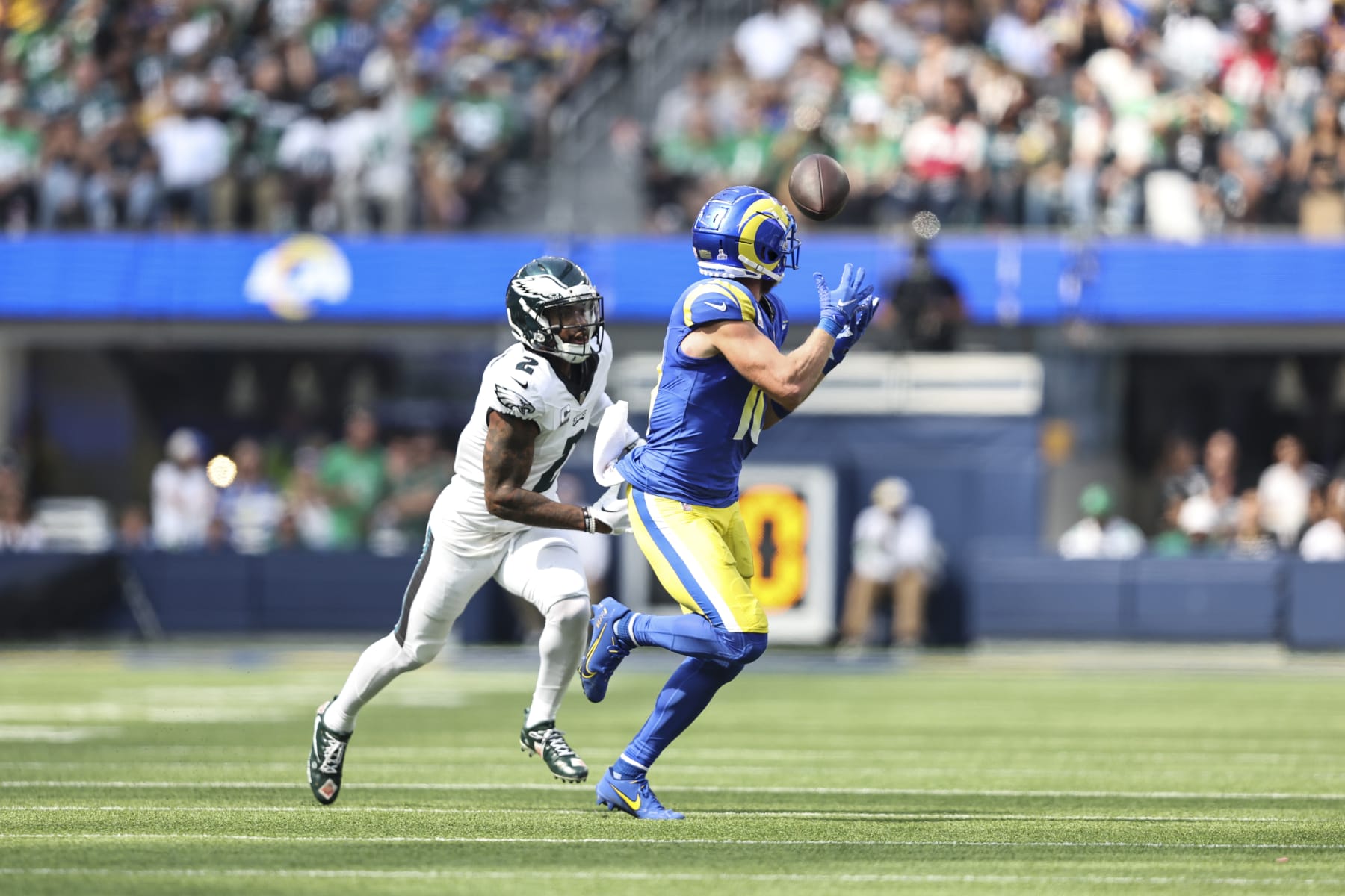 INGLEWOOD, CALIFORNIA - OCTOBER 08: Cooper Kupp #10 of the Los Angeles Rams completes a pass against Darius Slay #2 of the Philadelphia Eagles during an NFL football game between the Los Angeles Rams and the Philadelphia Eagles at SoFi Stadium on October 08, 2023 in Inglewood, California. (Photo by Michael Owens/Getty Images)