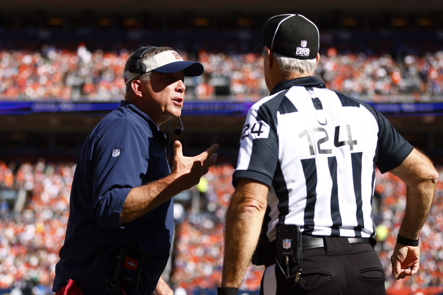 DENVER, COLORADO - OCTOBER 08: Head coach Sean Payton of the Denver Broncos argues with referee Carl Paganelli in the first quarter against the New York Jets at Empower Field At Mile High on October 08, 2023 in Denver, Colorado. (Photo by Justin Edmonds/Getty Images)