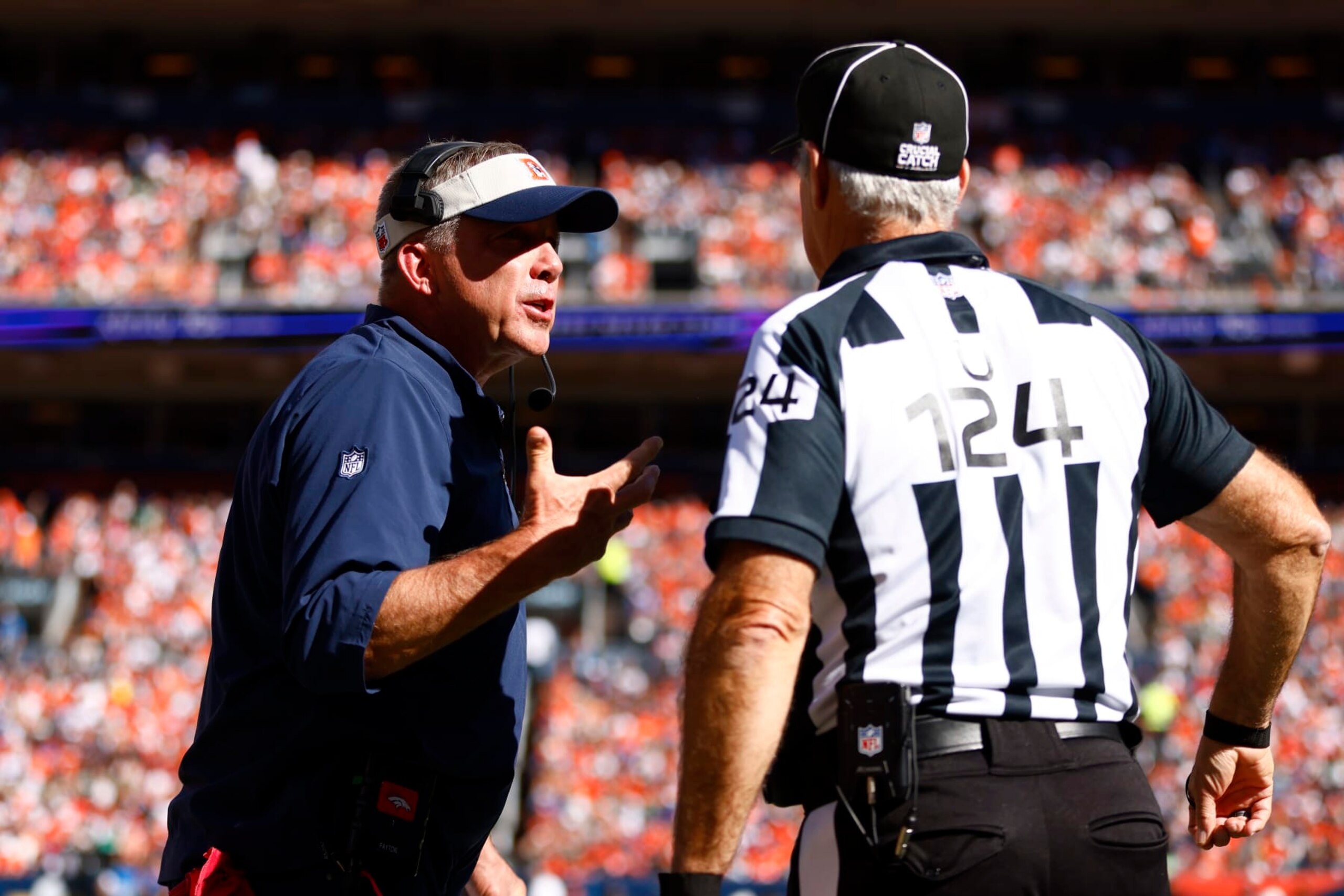 DENVER, COLORADO - OCTOBER 08: Head coach Sean Payton of the Denver Broncos argues with referee Carl Paganelli in the first quarter against the New York Jets at Empower Field At Mile High on October 08, 2023 in Denver, Colorado. (Photo by Justin Edmonds/Getty Images)