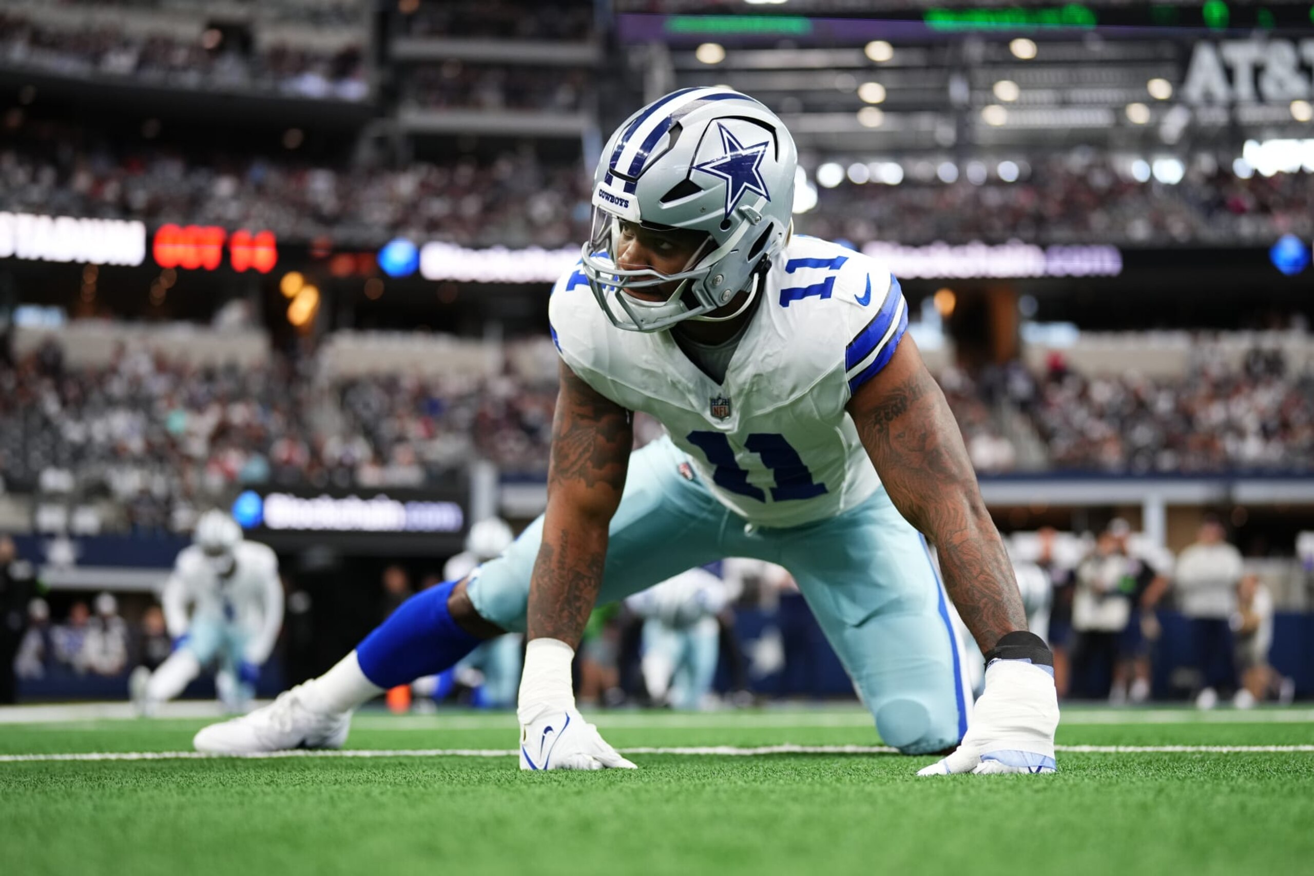ARLINGTON, TX - OCTOBER 01: Micah Parsons #11 of the Dallas Cowboys warms up before kickoff against the New England Patriots at AT&T Stadium on October 1, 2023 in Arlington, Texas. (Photo by Cooper Neill/Getty Images)