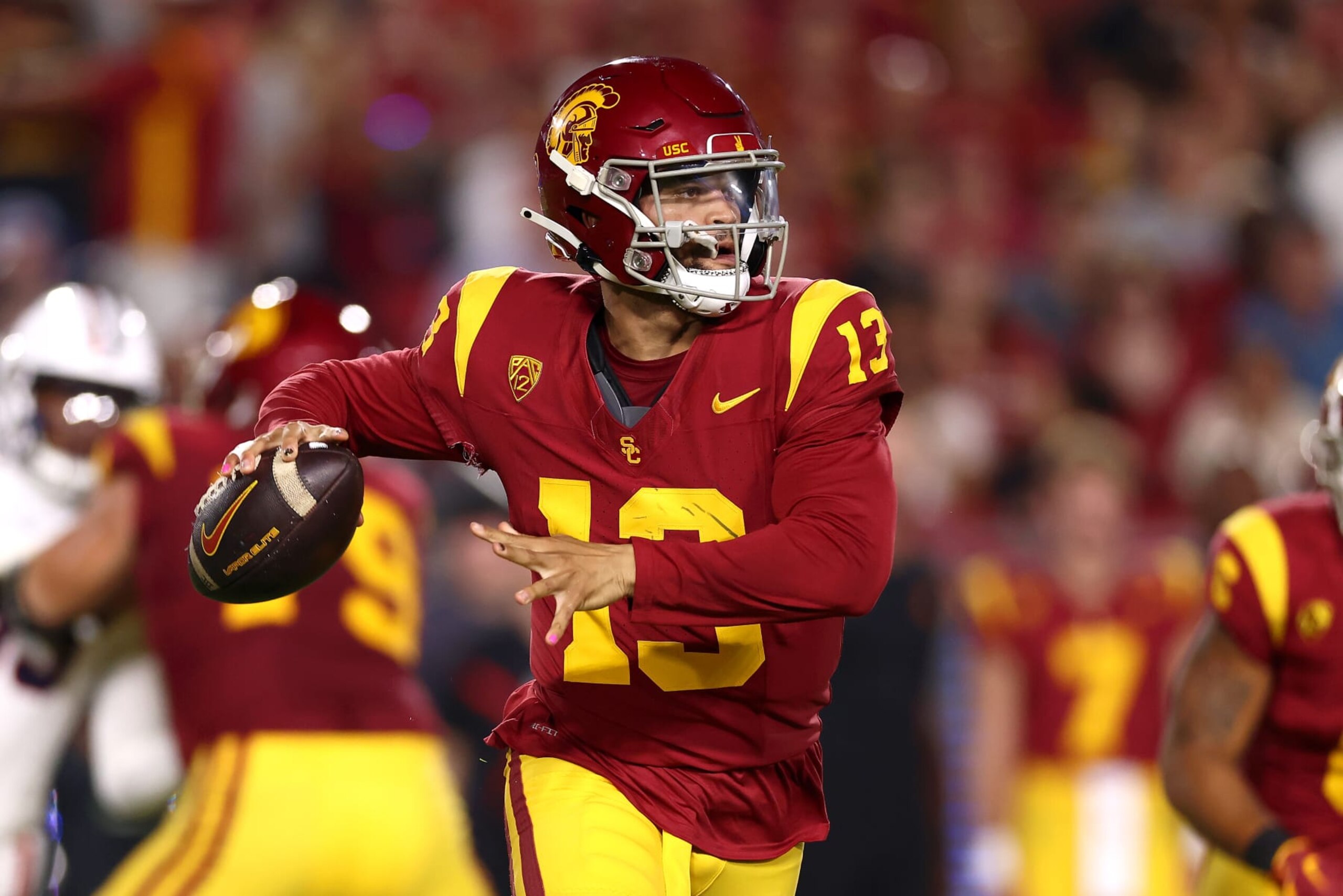 LOS ANGELES, CALIFORNIA - OCTOBER 07: Caleb Williams #13 of the USC Trojans looks to pass the ball during the first quarter against the Arizona Wildcats at United Airlines Field at the Los Angeles Memorial Coliseum on October 07, 2023 in Los Angeles, California. (Photo by Katelyn Mulcahy/Getty Images)