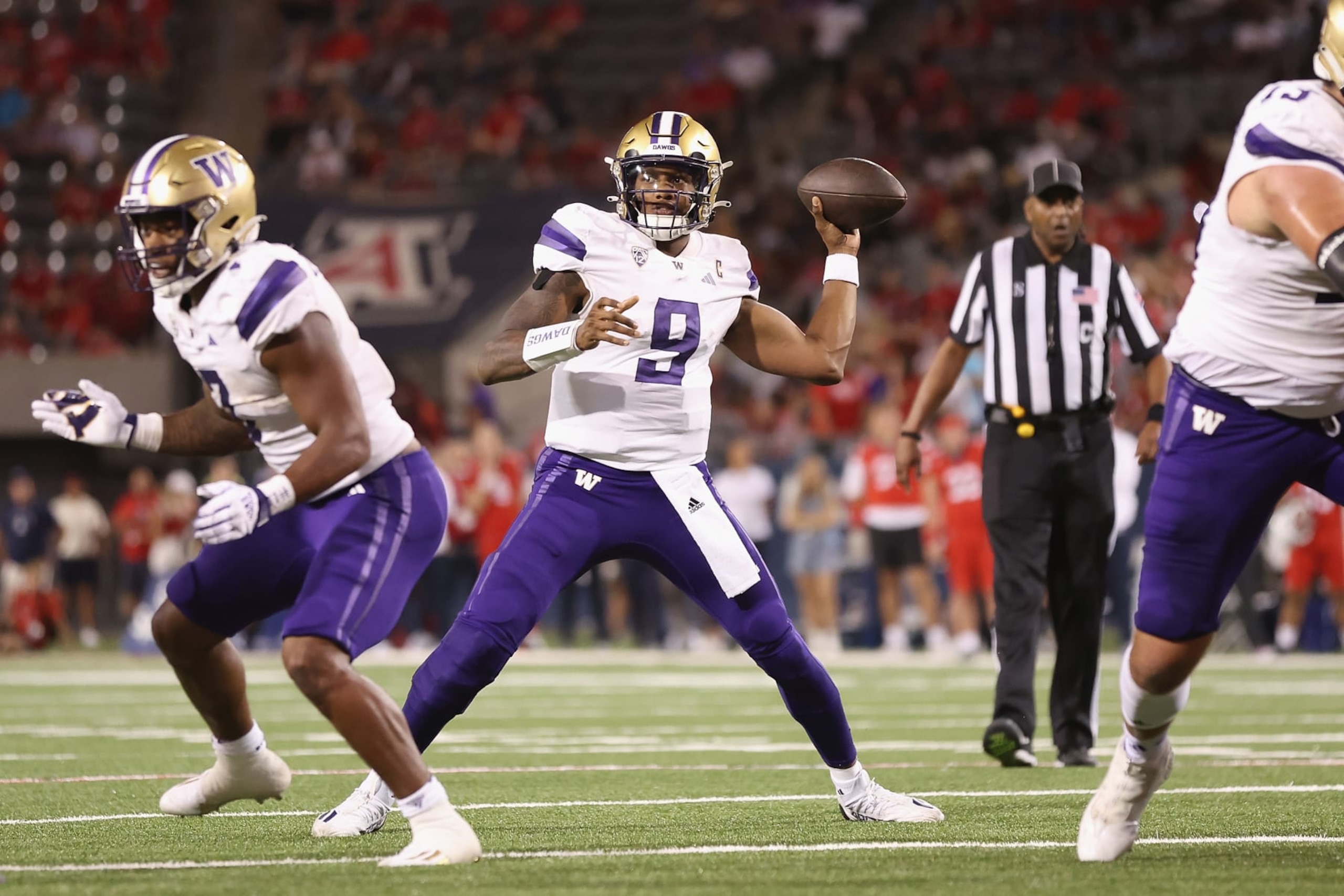 TUCSON, ARIZONA - SEPTEMBER 30: Quarterback Michael Penix Jr. #9 of the Washington Huskies throws a pass during the second half of the NCAAF game against the Arizona Wildcats at Arizona Stadium on September 30, 2023 in Tucson, Arizona. (Photo by Christian Petersen/Getty Images)