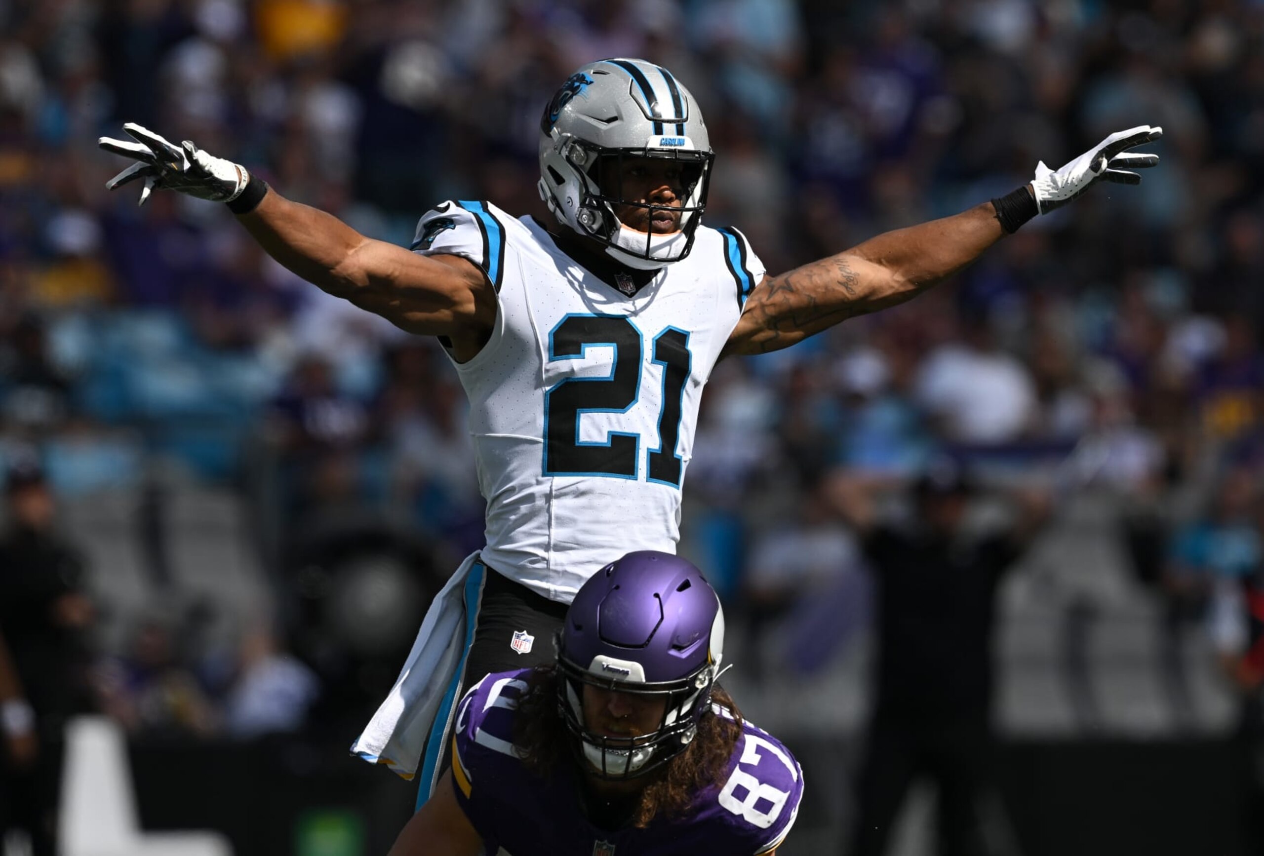 CHARLOTTE, NORTH CAROLINA - OCTOBER 01: Jeremy Chinn #21 of the Carolina Panthers celebrates breaking up a pass intended for T.J. Hockenson #87 of the Minnesota Vikings during the third quarter at Bank of America Stadium on October 01, 2023 in Charlotte, North Carolina. (Photo by Grant Halverson/Getty Images)