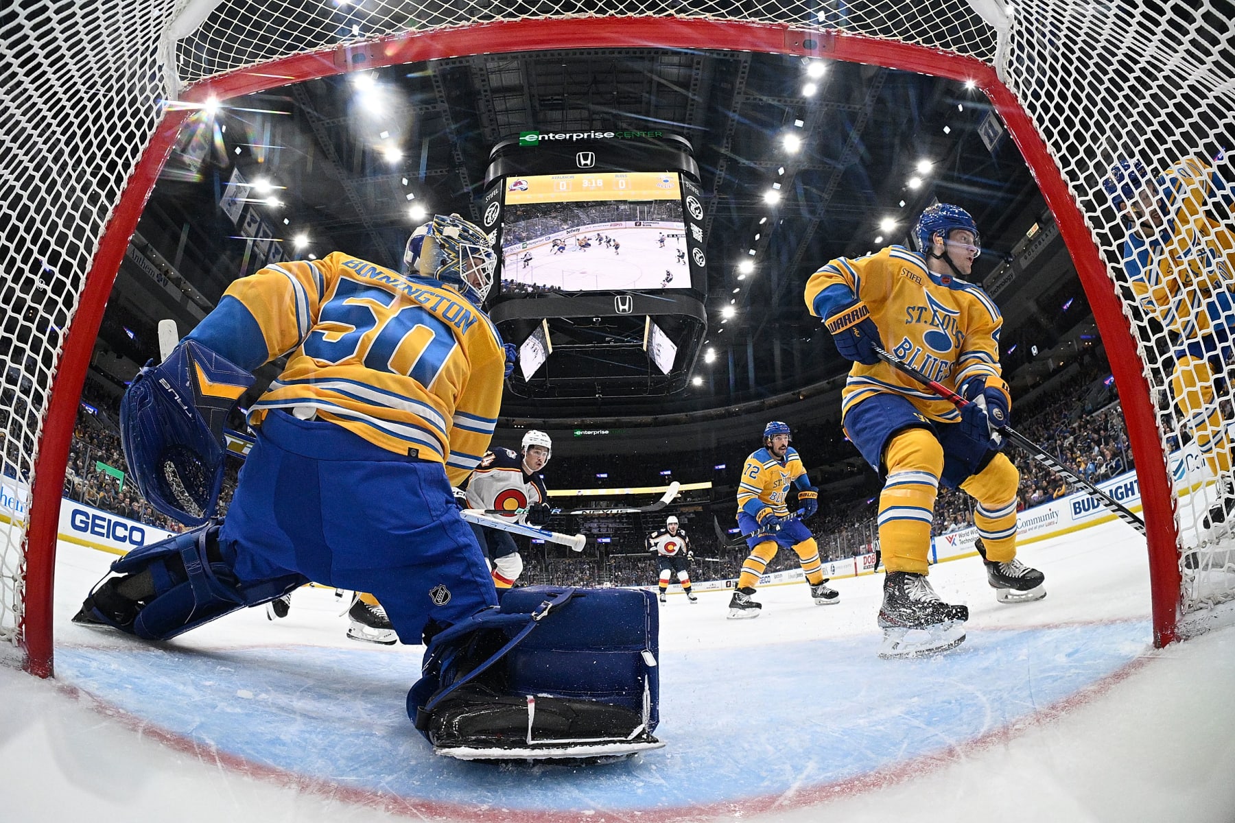 ST. LOUIS, MO - DECEMBER 11: Torey Krug #47 and Jordan Binnington #50 of the St. Louis Blues defend the net against the Colorado Avalanche at the Enterprise Center on December 11, 2022 in St. Louis, Missouri. (Photo by Scott Rovak/NHLI via Getty Images)