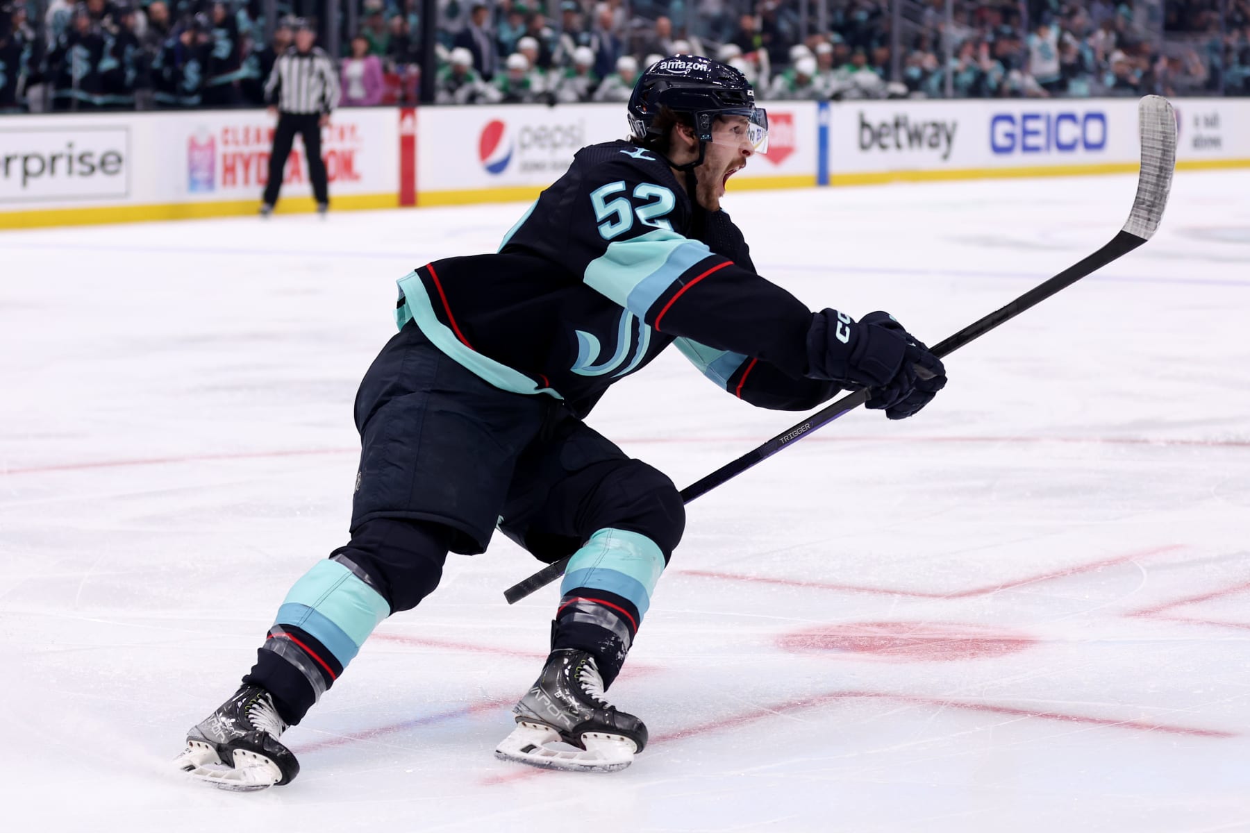 SEATTLE, WASHINGTON - MAY 13: Tye Kartye #52 of the Seattle Kraken celebrates his goal against the Dallas Stars during the second period in Game Six of the Second Round of the 2023 Stanley Cup Playoffs at Climate Pledge Arena on May 13, 2023 in Seattle, Washington. (Photo by Steph Chambers/Getty Images)
