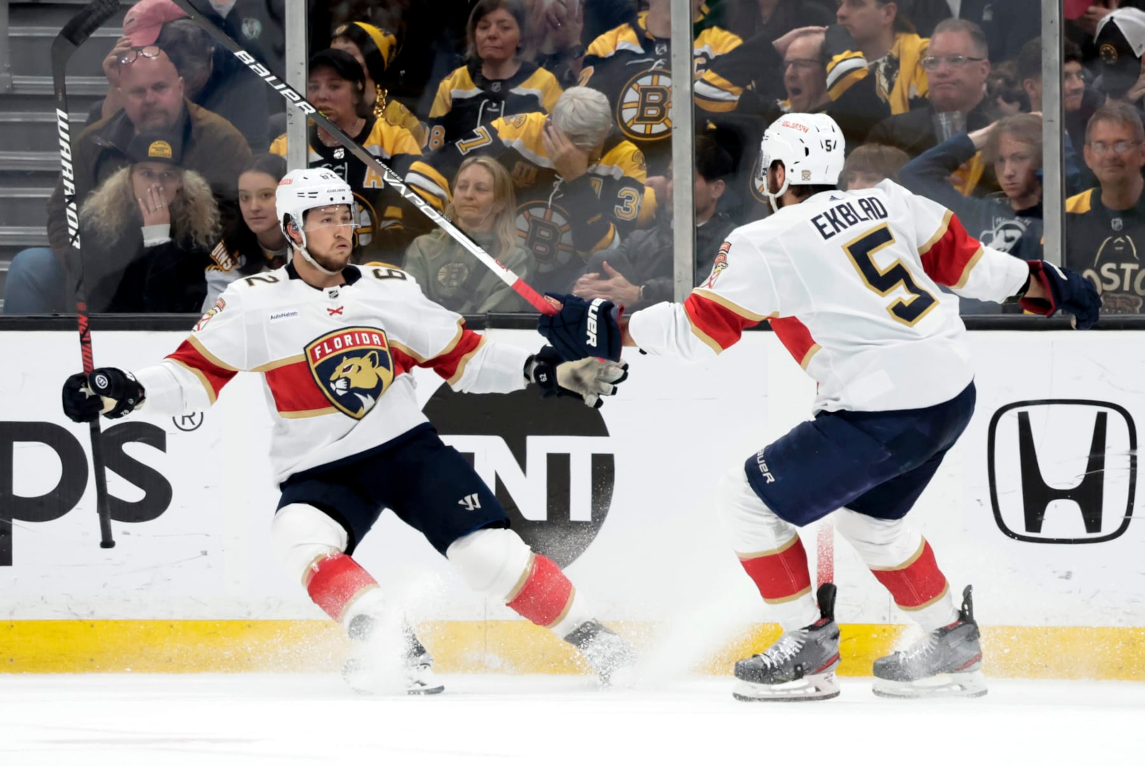 BOSTON, MA - APRIL 30: Florida Panthers defenseman Brandon Montour (62) reacts to his goal with Florida Panthers defenseman Aaron Ekblad (5) during Game 7 of an Eastern Conference First Round playoff contest between the Boston Bruins and the Florida Panthers on April 30, 2023, at TD Garden in Boston, Massachusetts.(Photo by Fred Kfoury III/Icon Sportswire via Getty Images)
