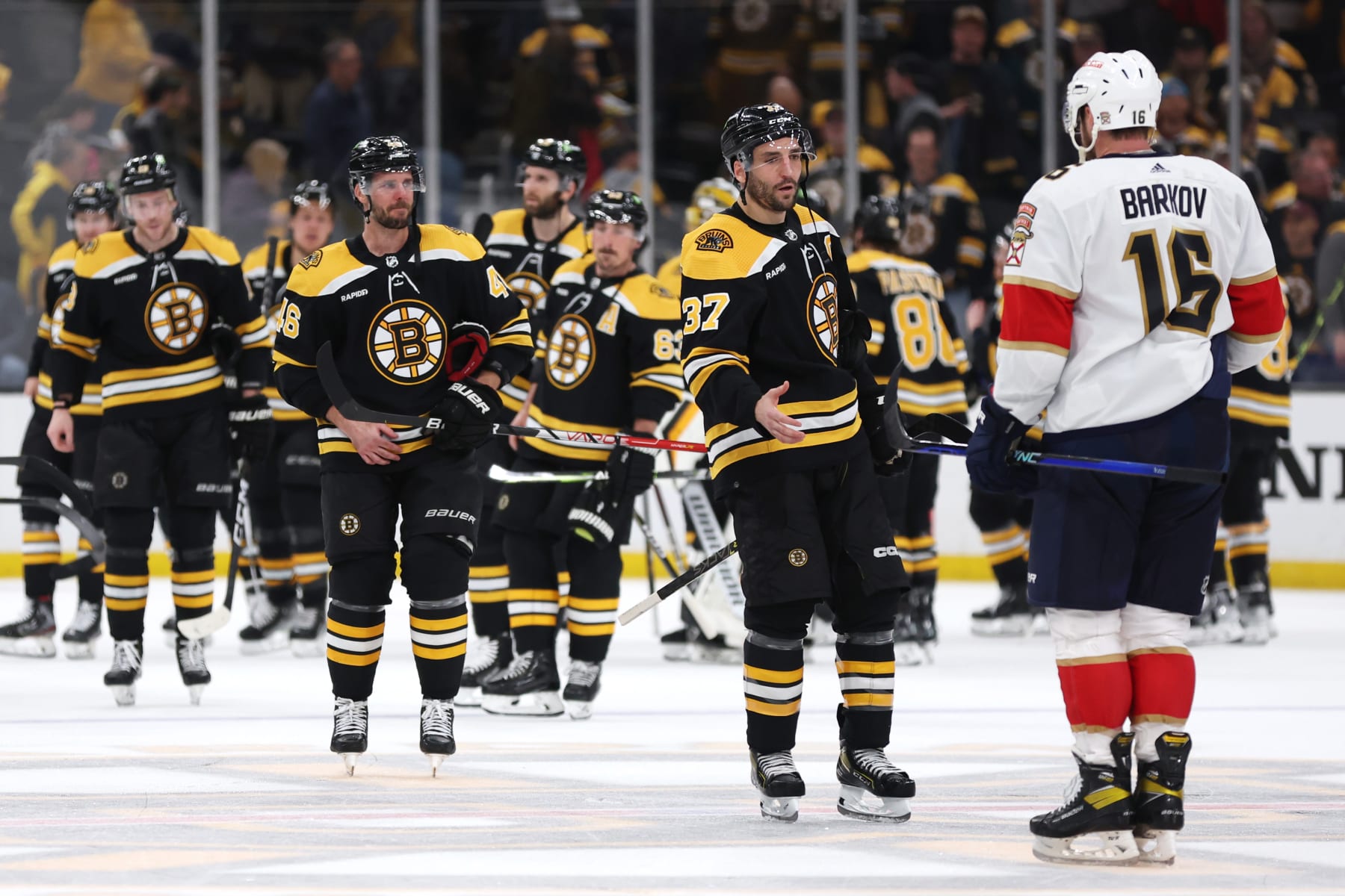BOSTON, MASSACHUSETTS - APRIL 30: Patrice Bergeron #37 of the Boston Bruins shakes hands with Aleksander Barkov #16 of the Florida Panthers after the Panthers defeat the Bruins 4-3 in overtime in Game Seven of the First Round of the 2023 Stanley Cup Playoffs at TD Garden on April 30, 2023 in Boston, Massachusetts.  (Photo by Maddie Meyer/Getty Images)