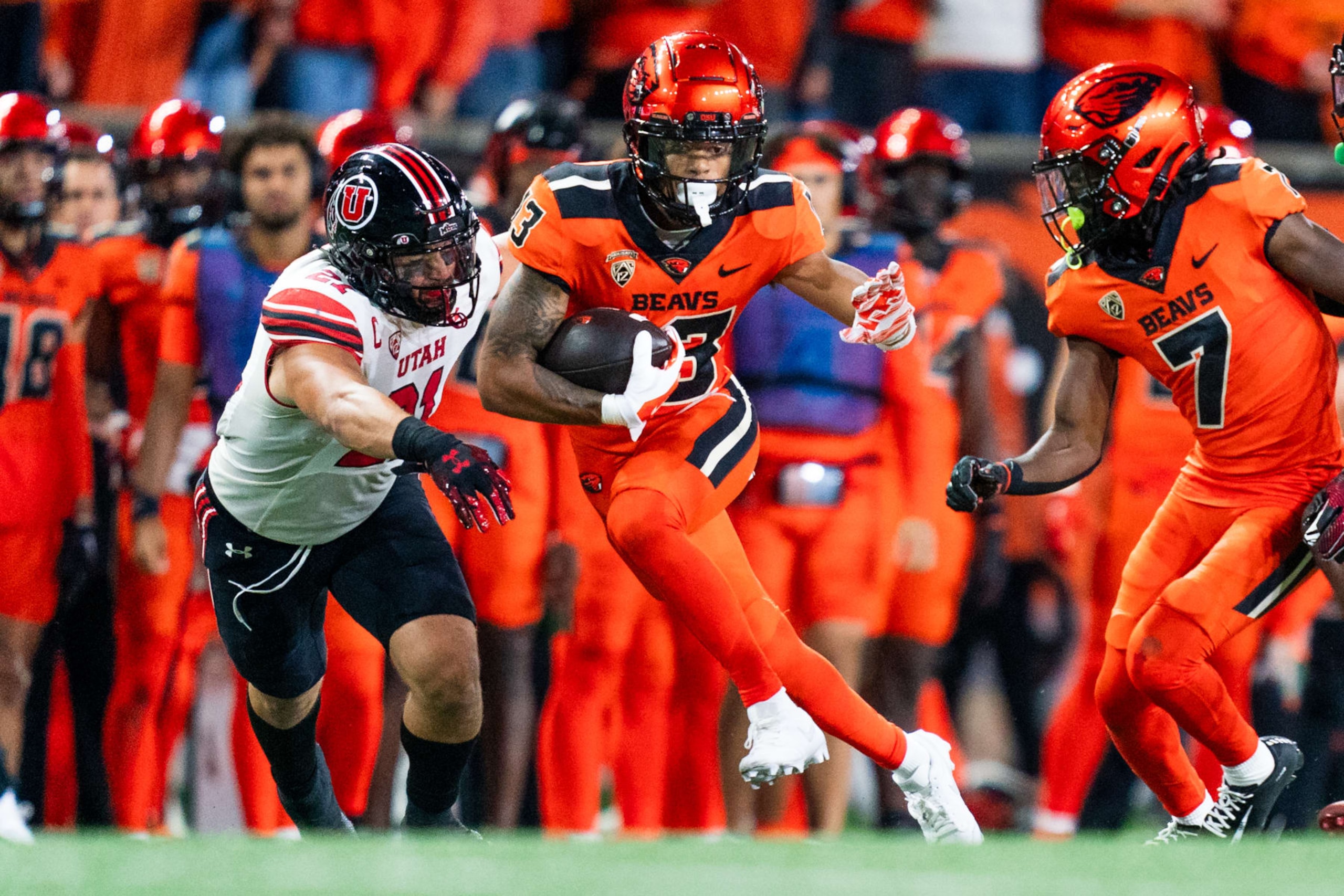 CORVALLIS, OREGON - SEPTEMBER 29: Wide receiver Jesiah Irish #13 of the Oregon State Beavers carries the ball during the first half of the game against the Utah Utes at Reser Stadium on September 29, 2023 in Corvallis, Oregon. (Photo by Ali Gradischer/Getty Images) CORVALLIS, OREGON - SEPTEMBER 29: Wide receiver Jesiah Irish #13 of the Oregon State Beavers carries the ball during the first half of the game against the Utah Utes at Reser Stadium on September 29, 2023 in Corvallis, Oregon. (Photo by Ali Gradischer/Getty Images)