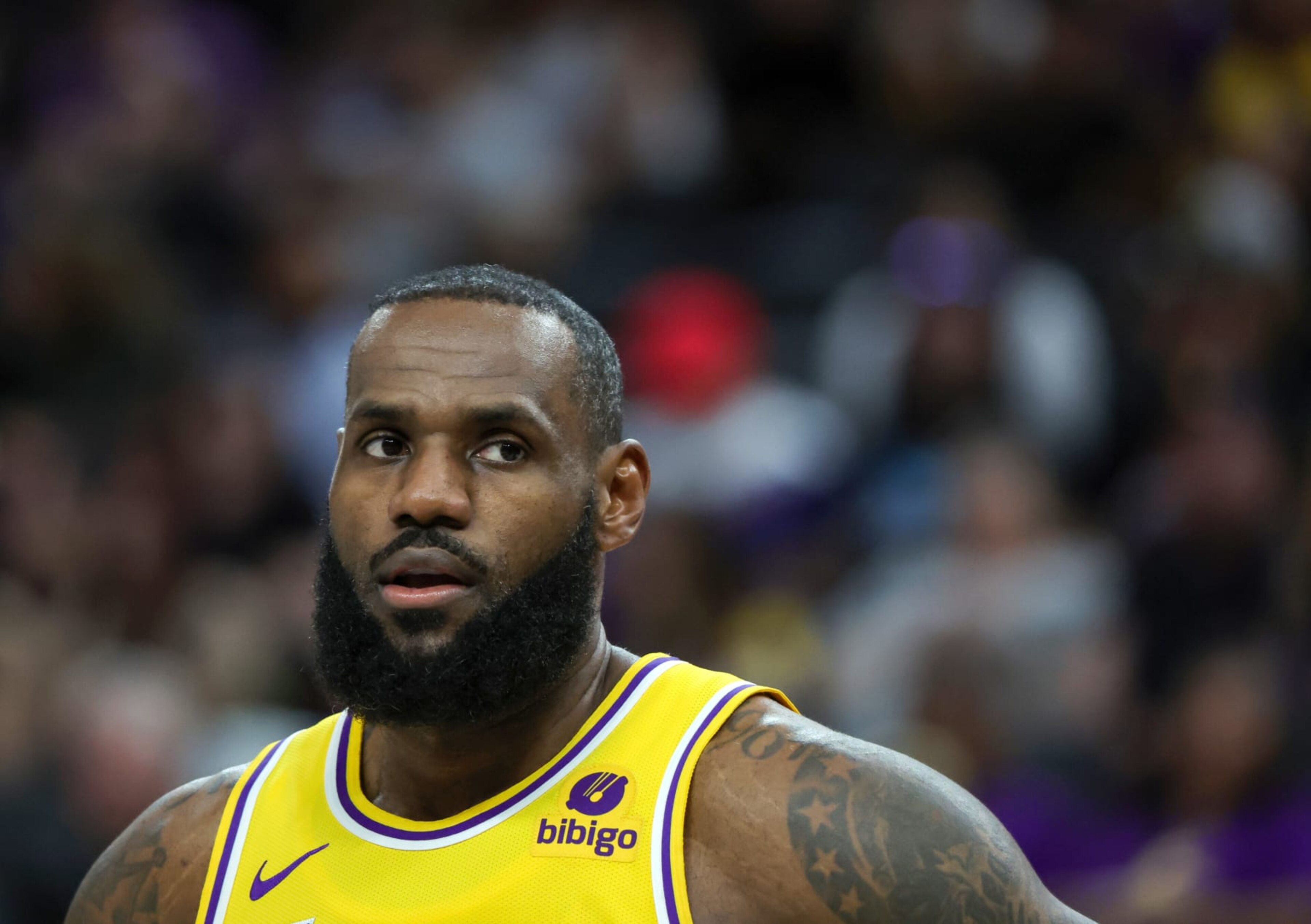 LAS VEGAS, NEVADA - OCTOBER 09: LeBron James #23 of the Los Angeles Lakers stands on the court during a break in the first quarter of a preseason game against the Brooklyn Nets at T-Mobile Arena on October 09, 2023 in Las Vegas, Nevada. The Lakers defeated the Nets 129-126. NOTE TO USER: User expressly acknowledges and agrees that, by downloading and or using this photograph, User is consenting to the terms and conditions of the Getty Images License Agreement. (Photo by Ethan Miller/Getty Images)
