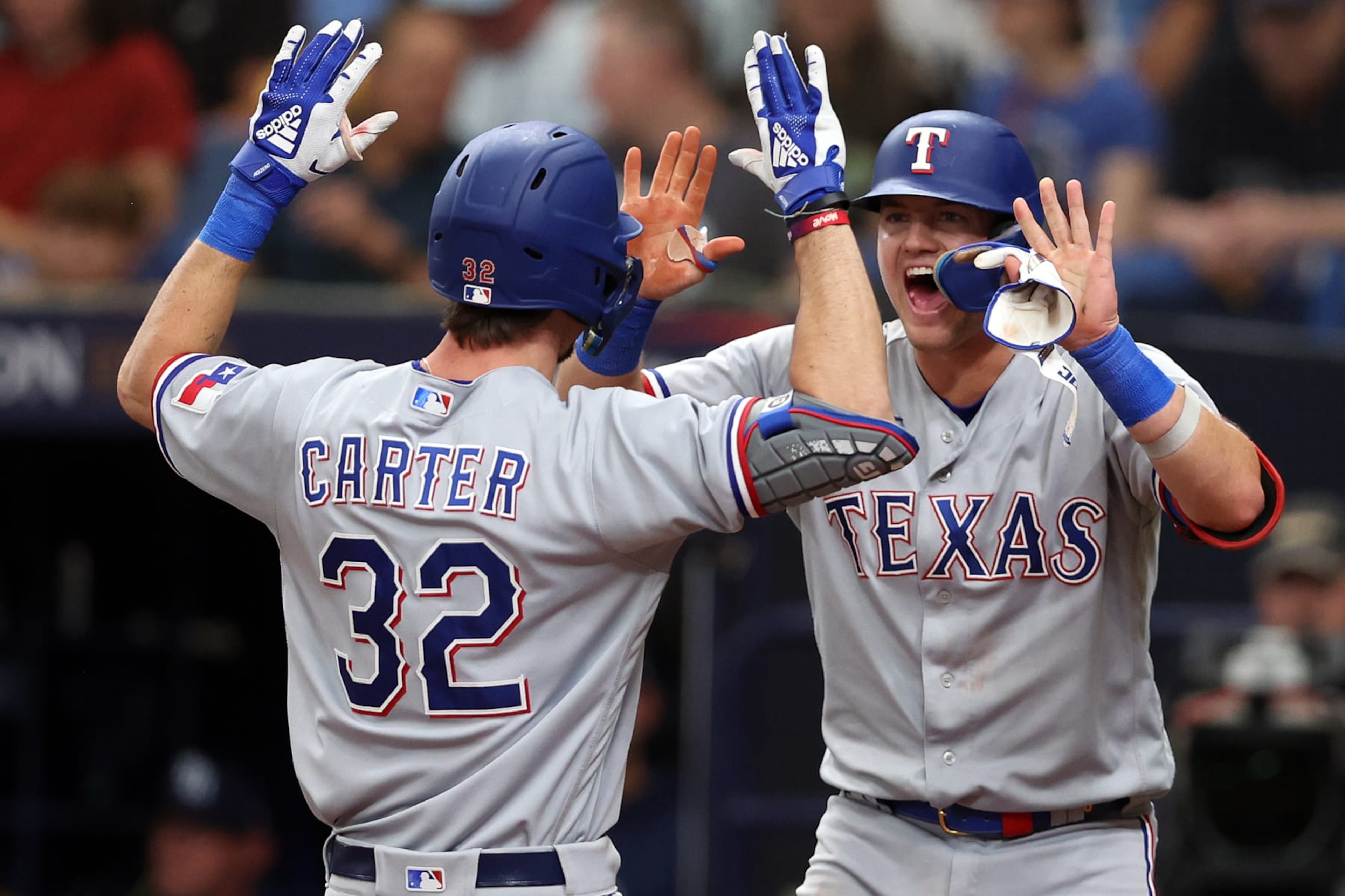 Texas' Evan Carter and Josh Jung