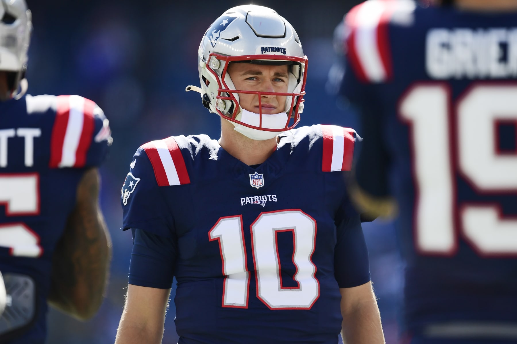 FOXBOROUGH, MASSACHUSETTS - OCTOBER 08: Mac Jones #10 of the New England Patriots looks on prior to a game against the New Orleans Saints at Gillette Stadium on October 08, 2023 in Foxborough, Massachusetts. (Photo by Maddie Malhotra/Getty Images)
