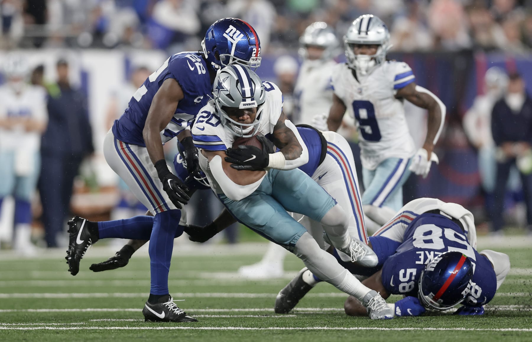 EAST RUTHERFORD, NEW JERSEY - SEPTEMBER 10: (NEW YORK DAILIES OUT)  Tony Pollard #20 of the Dallas Cowboys in action against the New York Giants at MetLife Stadium on September 10, 2023 in East Rutherford, New Jersey. The Cowboys defeated the Giants 40-0. (Photo by Jim McIsaac/Getty Images)
