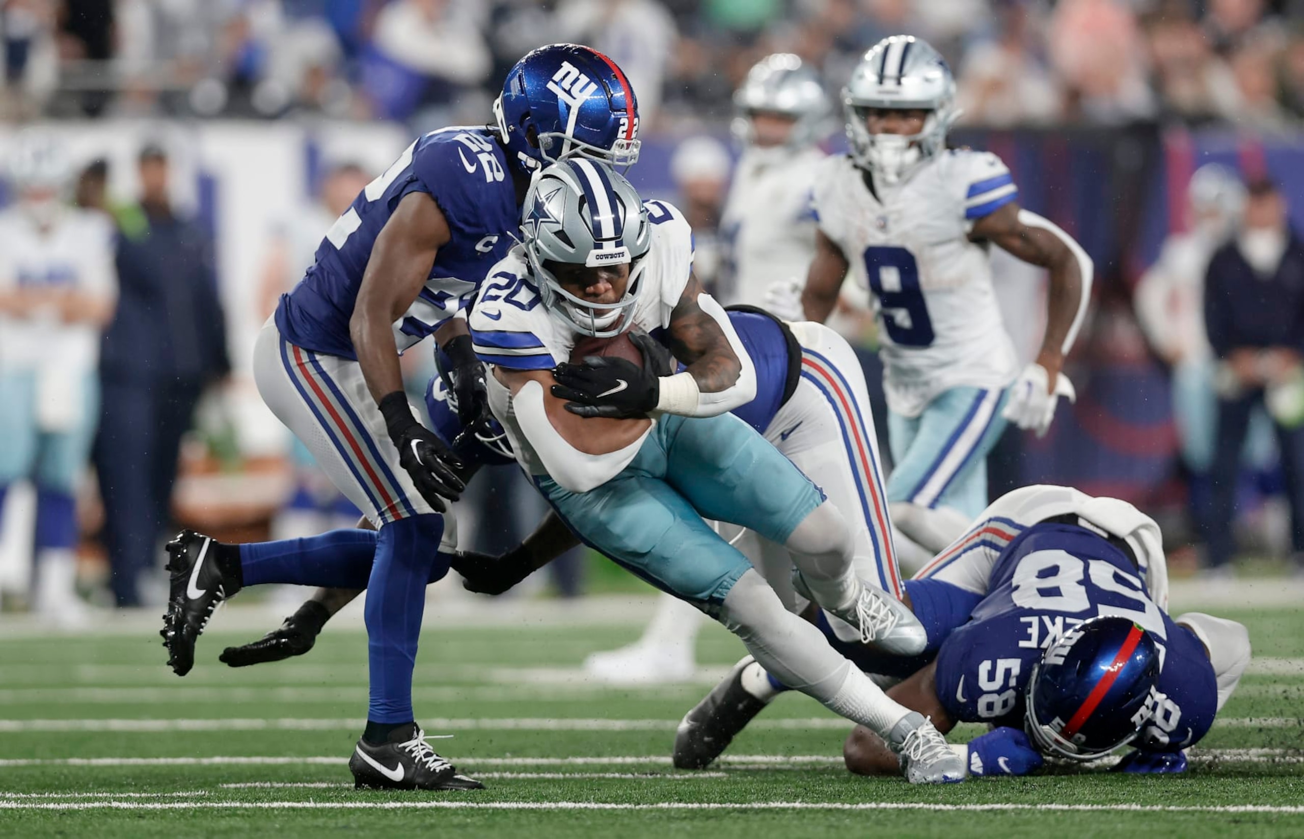 EAST RUTHERFORD, NEW JERSEY - SEPTEMBER 10: (NEW YORK DAILIES OUT)  Tony Pollard #20 of the Dallas Cowboys in action against the New York Giants at MetLife Stadium on September 10, 2023 in East Rutherford, New Jersey. The Cowboys defeated the Giants 40-0. (Photo by Jim McIsaac/Getty Images)