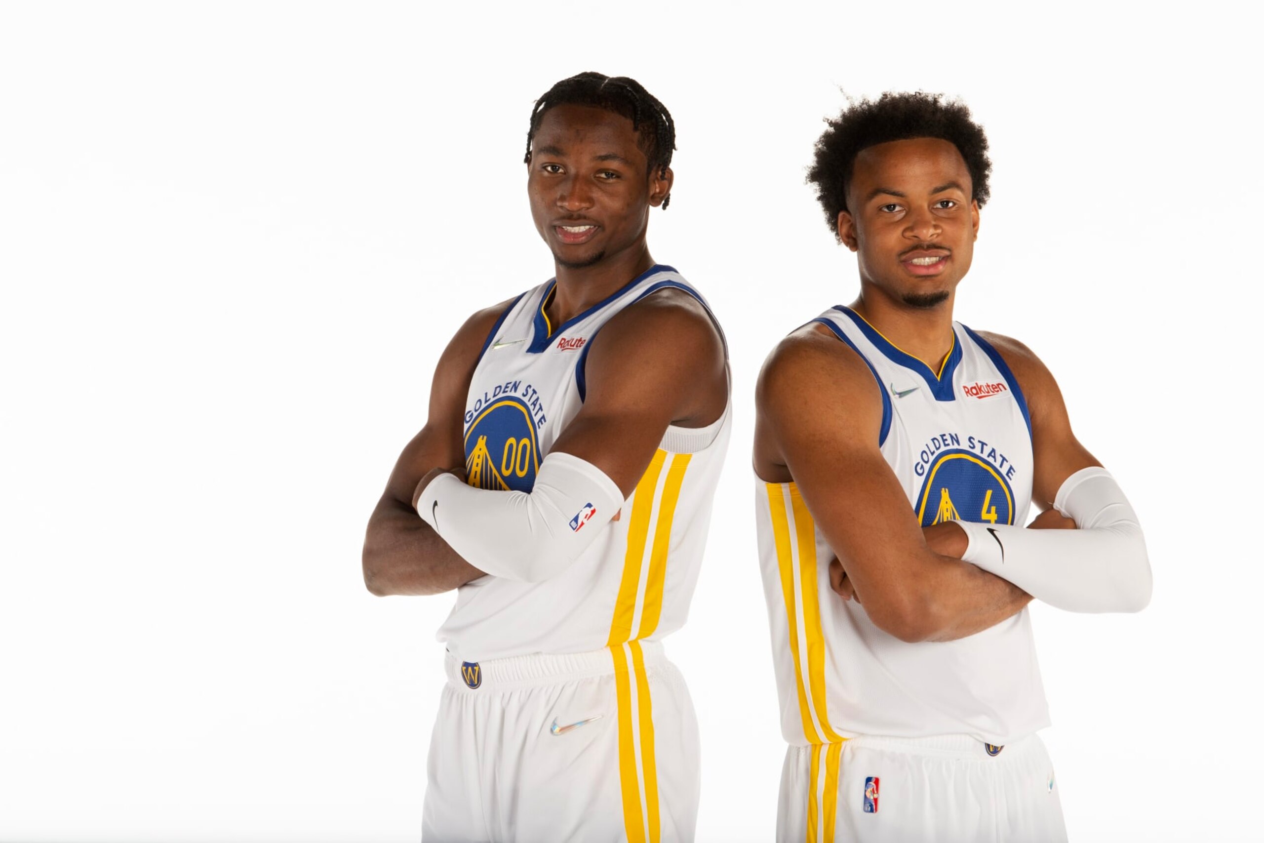 SAN FRANCISCO, CA - SEPTEMBER: Jonathan Kuminga #00 and Moses Moody #4 of the Golden State Warriors pose for a portrait during NBA media day on September 27, 2021 at Chase Center in San Francisco, California. NOTE TO USER: User expressly acknowledges and agrees that, by downloading and or using this photograph, user is consenting to the terms and conditions of Getty Images License Agreement. Mandatory Copyright Notice: Copyright 2021 NBAE (Photo by Noah Graham/NBAE via Getty Images)