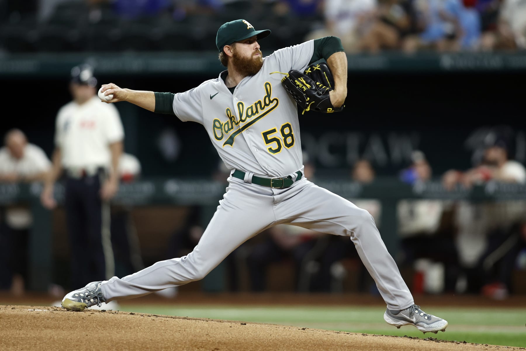 ARLINGTON, TEXAS - SEPTEMBER 08: Paul Blackburn #58 of the Oakland Athletics throws a pitch in the first inning against the Texas Rangers at Globe Life Field on September 08, 2023 in Arlington, Texas. (Photo by Tim Heitman/Getty Images)