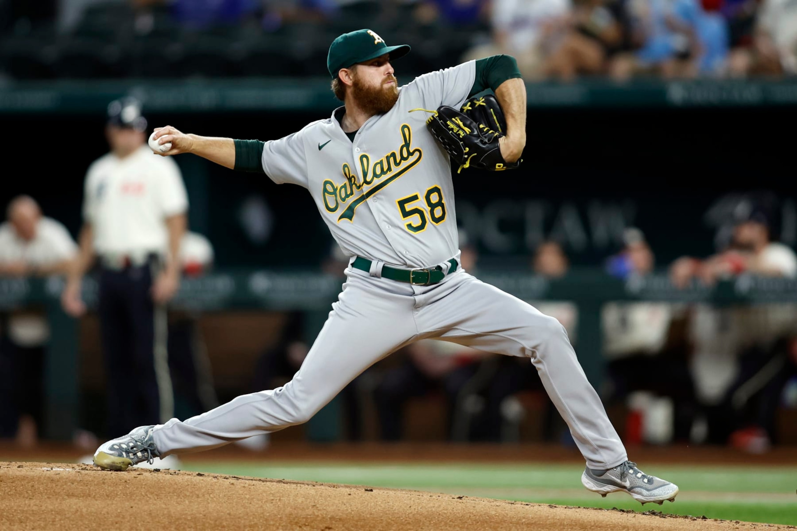 ARLINGTON, TEXAS - SEPTEMBER 08: Paul Blackburn #58 of the Oakland Athletics throws a pitch in the first inning against the Texas Rangers at Globe Life Field on September 08, 2023 in Arlington, Texas. (Photo by Tim Heitman/Getty Images)