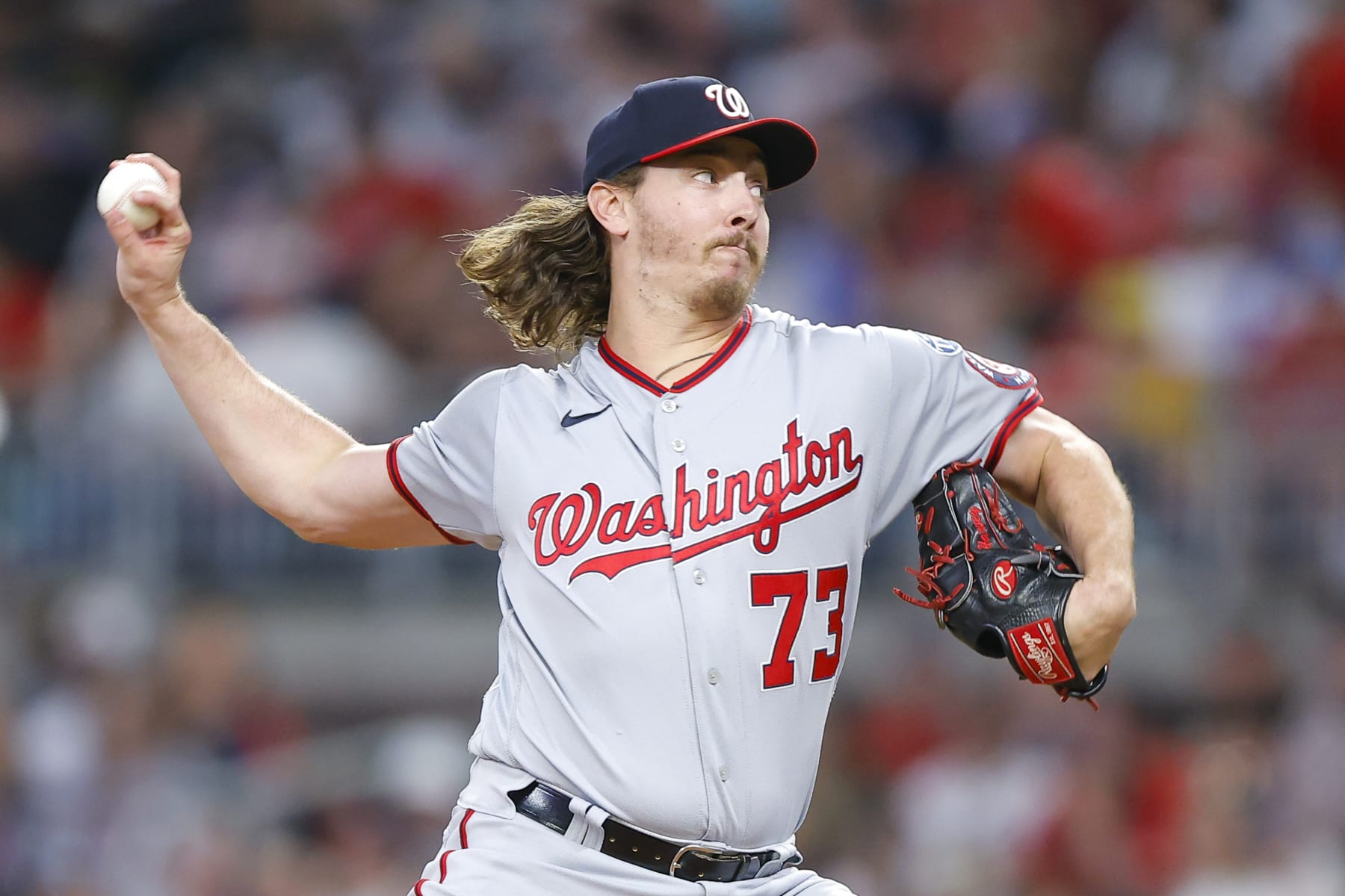 ATLANTA, GEORGIA - SEPTEMBER 29: Hunter Harvey #73 of the Washington Nationals pitches during the seventh inning against the Atlanta Braves at Truist Park on September 29, 2023 in Atlanta, Georgia. (Photo by Todd Kirkland/Getty Images)