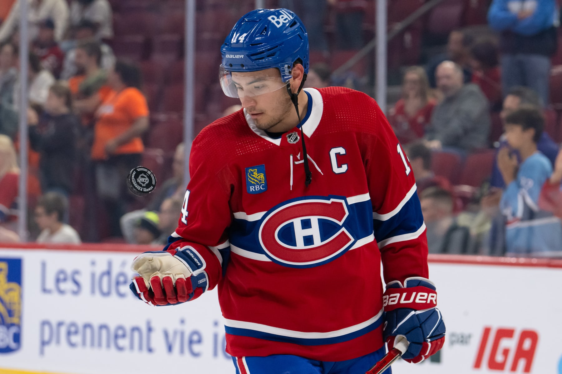 MONTREAL, QC - SEPTEMBER 30: Nick Suzuki (14) of the Montreal Canadiens catches the puck during the warmup period of the NHL pre-season game between the Toronto Maple Leafs and the Montreal Canadiens on September 30, 2023, at the Bell Centre in Montreal, QC(Photo by Vincent Ethier/Icon Sportswire via Getty Images)