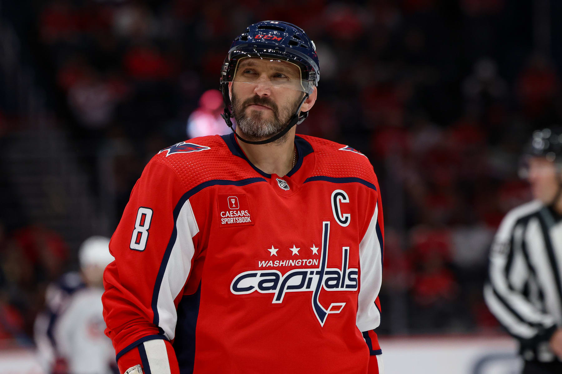 WASHINGTON, DC - October 7: Alex Ovechkin #8 of the Washington Capitals looks into the stands between face-offs during a pre-season game against the Columbus Blue Jackets at Capital One Arena on October 7, 2023 in Washington, D.C. (Photo by John McCreary/NHLI via Getty Images)