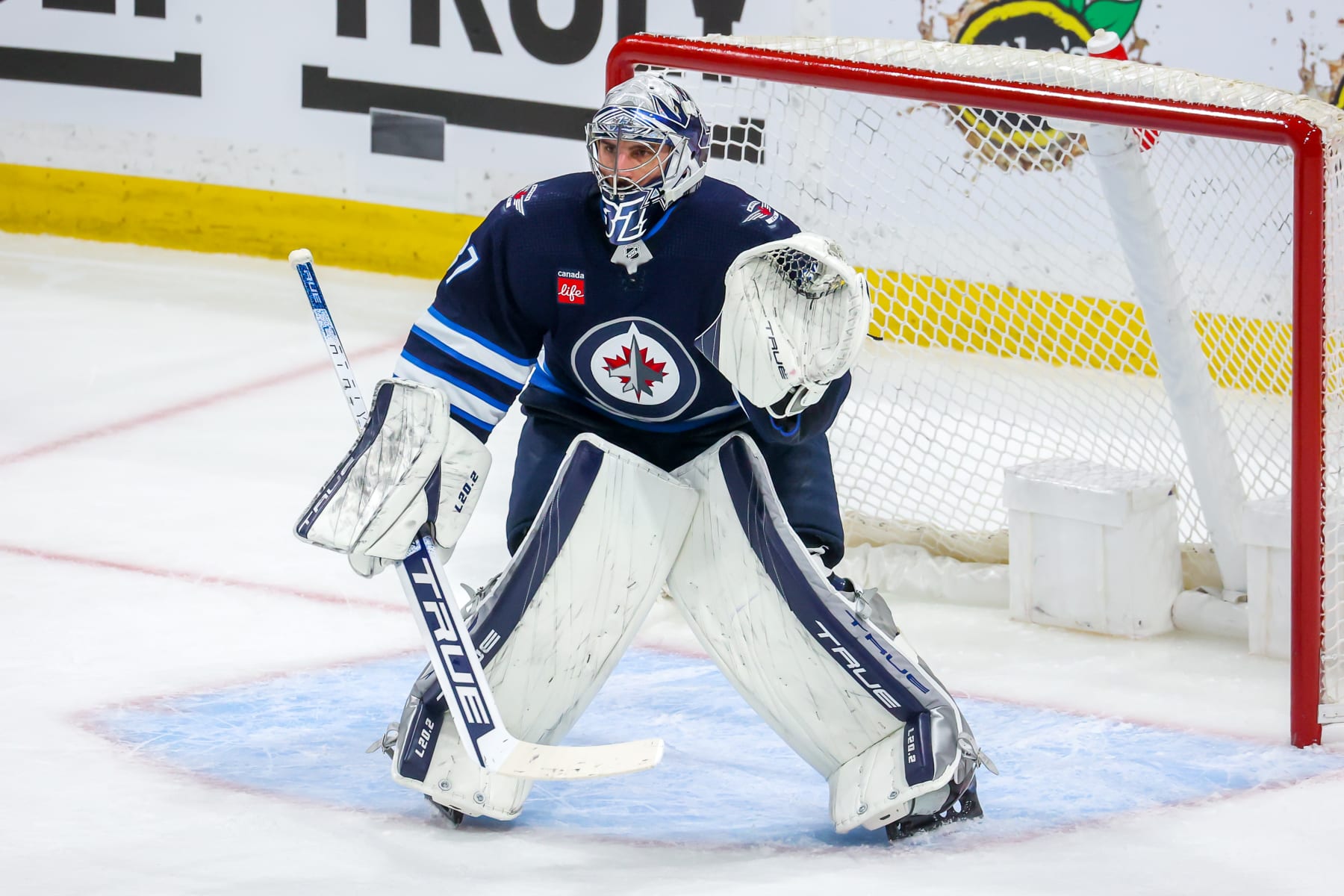 WINNIPEG, CANADA - APRIL 24: Goaltender Connor Hellebuyck #37 of the Winnipeg Jets guards the net during first period action against the Vegas Golden Knights in Game Four of the First Round of the 2023 Stanley Cup Playoffs at Canada Life Centre on April 24, 2023 in Winnipeg, Manitoba, Canada. (Photo by Jonathan Kozub/NHLI via Getty Images)
