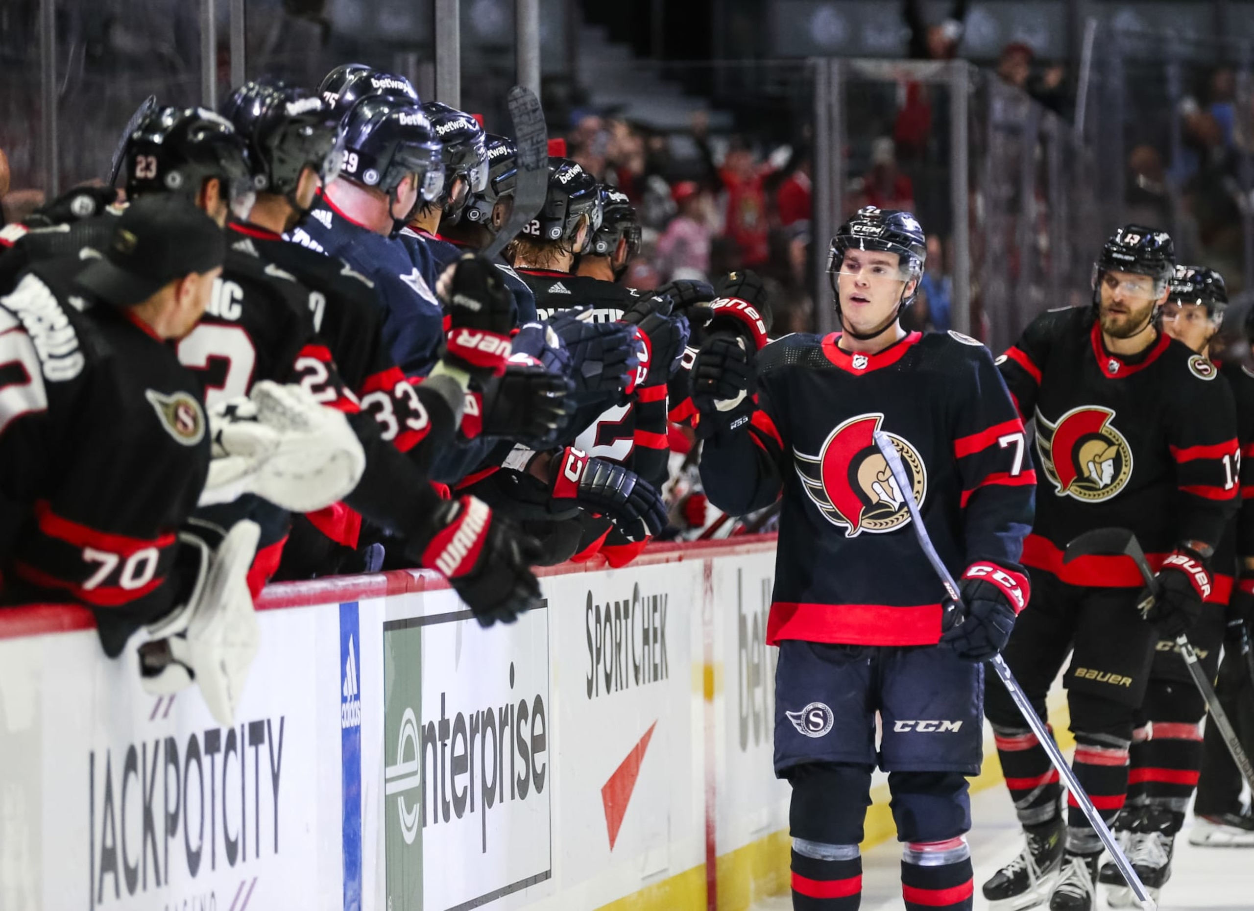 OTTAWA, CANADA - OCTOBER 07: Ridly Greig #71 of the Ottawa Senators celebrates his third period of a preseason game goal against the Montreal Canadiens with his teammates on the bench at Canadian Tire Centre on October 07, 2023 in Ottawa, Canada. (Photo by Chris Tanouye/Freestyle Photography/Getty Images) OTTAWA, CANADA - OCTOBER 07: Ridly Greig #71 of the Ottawa Senators celebrates his third period of a preseason game goal against the Montreal Canadiens with his teammates on the bench at Canadian Tire Centre on October 07, 2023 in Ottawa, Canada. (Photo by Chris Tanouye/Freestyle Photography/Getty Images)
