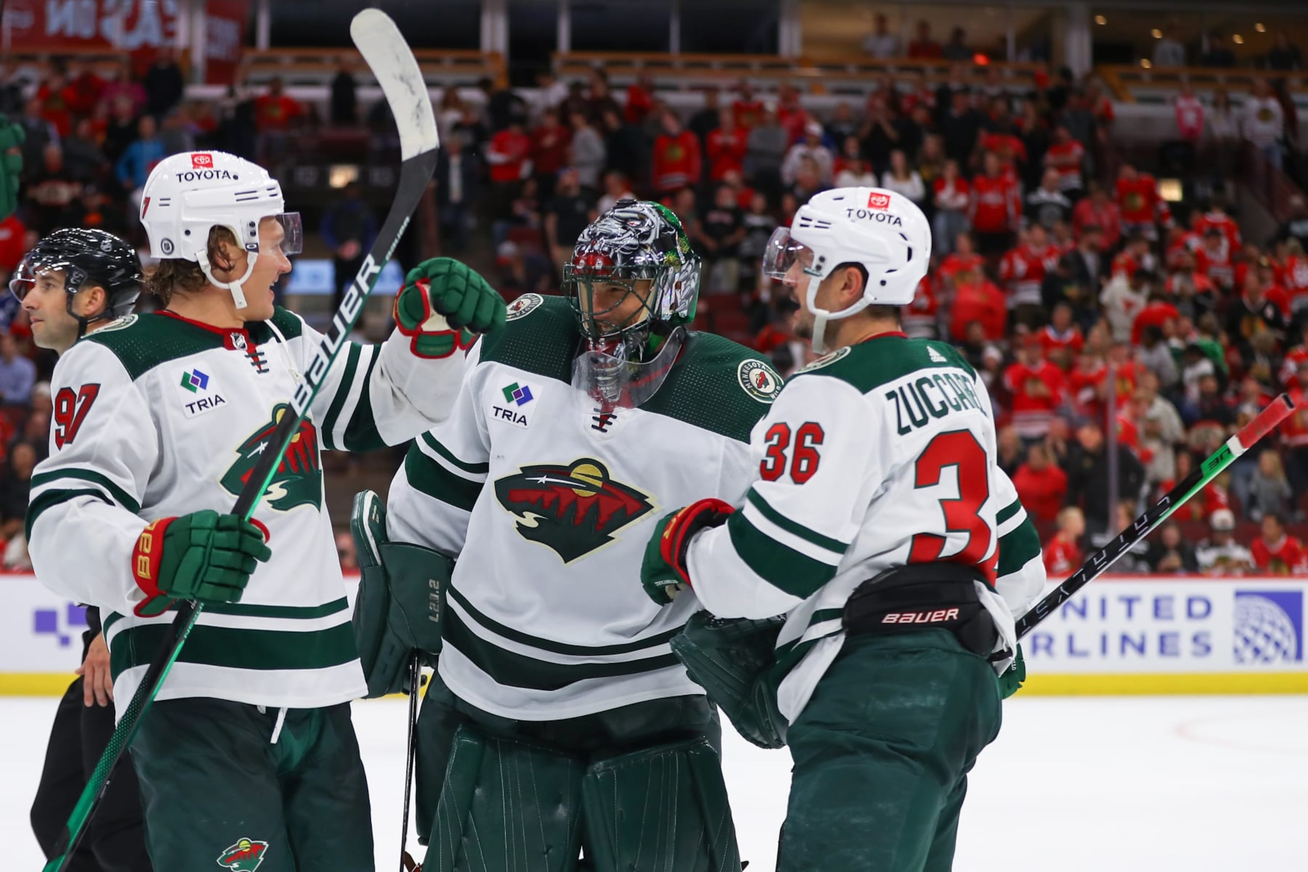 CHICAGO, IL - OCTOBER 05: Minnesota Wild goaltender Marc-Andre Fleury (29) celebrates with Minnesota Wild left wing Kirill Kaprizov (97) and Minnesota Wild right wing Mats Zuccarello (36) after a game between the Minnesota Wild and the Chicago Blackhawks on October 5, 2023 at the United Center in Chicago, IL. (Photo by Melissa Tamez/Icon Sportswire via Getty Images) CHICAGO, IL - OCTOBER 05: Minnesota Wild goaltender Marc-Andre Fleury (29) celebrates with Minnesota Wild left wing Kirill Kaprizov (97) and Minnesota Wild right wing Mats Zuccarello (36) after a game between the Minnesota Wild and the Chicago Blackhawks on October 5, 2023 at the United Center in Chicago, IL. (Photo by Melissa Tamez/Icon Sportswire via Getty Images)