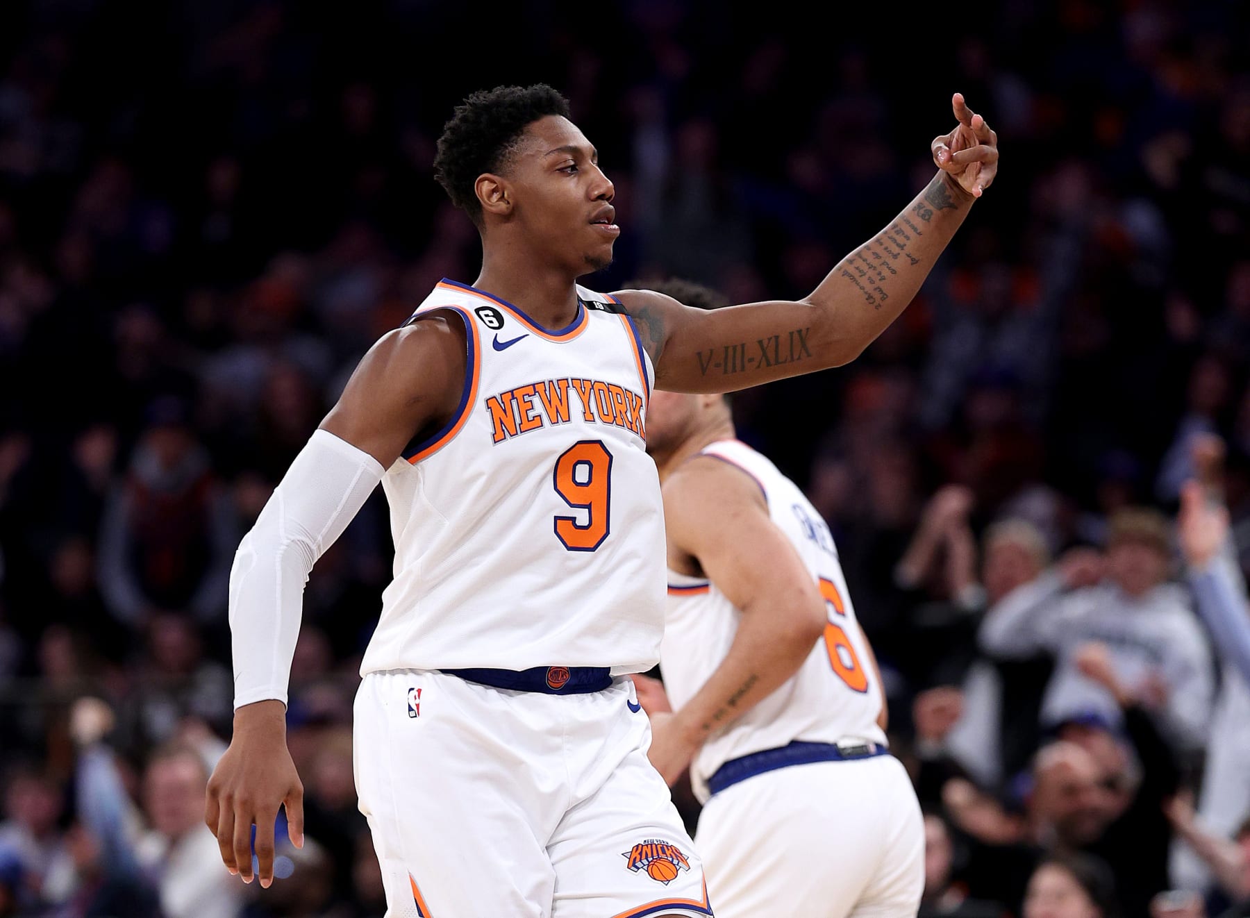 NEW YORK, NEW YORK - APRIL 09:  RJ Barrett #9 of the New York Knicks celebrates teammate Quentin Grimes' three point shot in the fourth quarter against the Indiana Pacers at Madison Square Garden on April 09, 2023 in New York City. NOTE TO USER: User expressly acknowledges and agrees that, by downloading and or using this photograph, User is consenting to the terms and conditions of the Getty Images License Agreement. (Photo by Elsa/Getty Images)