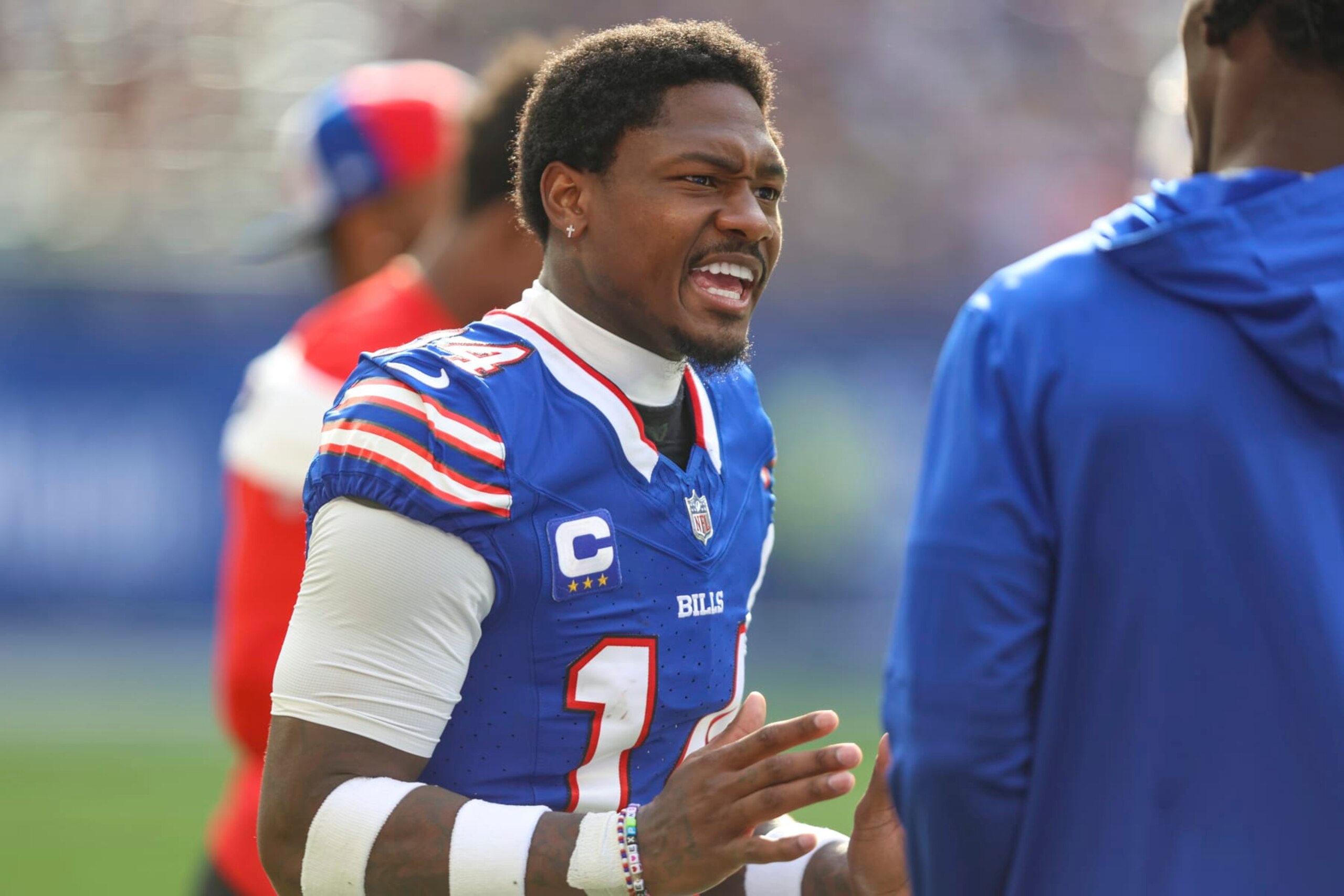 Buffalo Bills wide receiver Stefon Diggs (14) talks with a teammate during an NFL football game against the Jacksonville Jaguars, Sunday, Oct. 8, 2023, in London. (AP/Gary McCullough) Buffalo Bills wide receiver Stefon Diggs (14) talks with a teammate during an NFL football game against the Jacksonville Jaguars, Sunday, Oct. 8, 2023, in London. (AP/Gary McCullough)