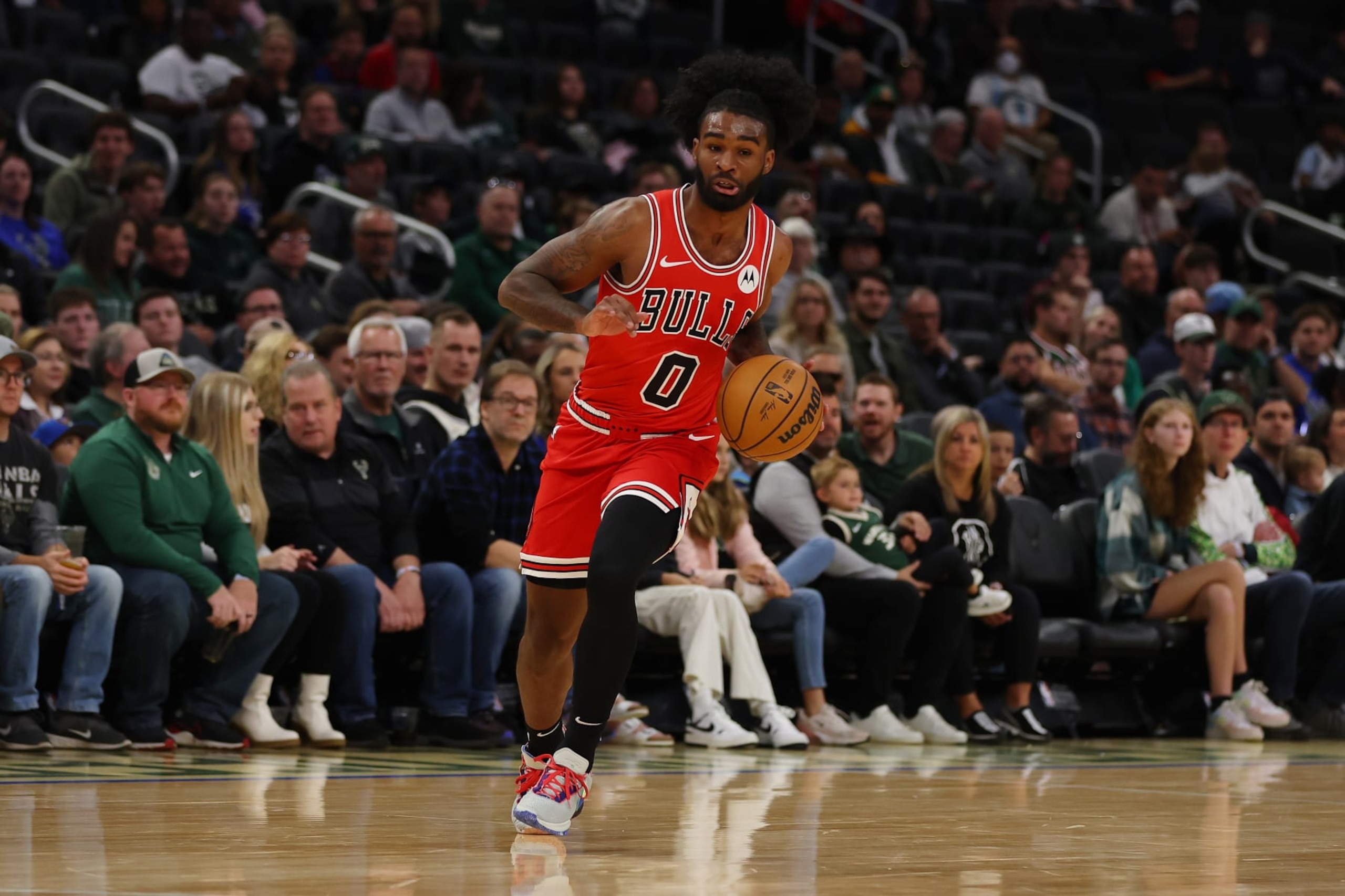 MILWAUKEE, WISCONSIN - OCTOBER 08: Coby White #0 of the Chicago Bulls handles the ball against the Milwaukee Bucks during a preseason game at Fiserv Forum on October 08, 2023 in Milwaukee, Wisconsin. NOTE TO USER: User expressly acknowledges and agrees that, by downloading and or using this photograph, User is consenting to the terms and conditions of the Getty Images License Agreement. (Photo by Stacy Revere/Getty Images)