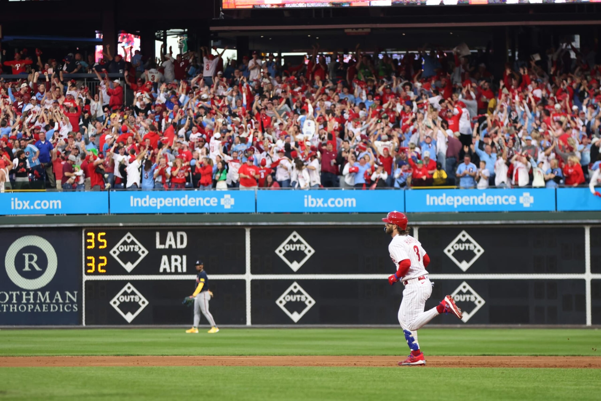 PHILADELPHIA, PA - OCTOBER 11: Bryce Harper #3 of the Philadelphia Phillies rounds the bases after hitting a three-run home run in the third inning during Game 3 of the Division Series between the Atlanta Braves and the Philadelphia Phillies at Citizens Bank Park on Wednesday, October 11, 2023 in Philadelphia, Pennsylvania. (Photo by Rob Tringali/MLB Photos via Getty Images)