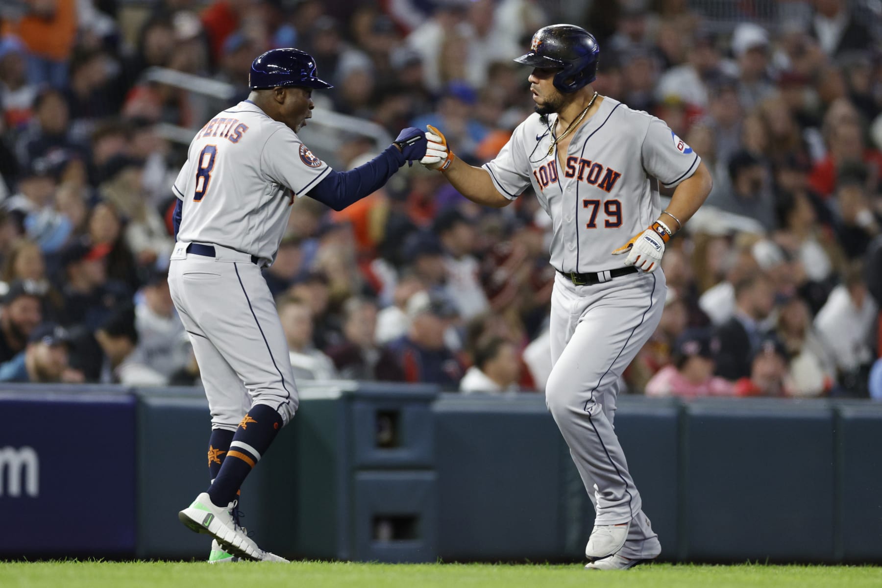MINNEAPOLIS, MINNESOTA - OCTOBER 11: Jose Abreu #79 of the Houston Astros celebrates his two-run home run against the Minnesota Twins with Gary Pettis #8 during the fourth inning in Game Four of the Division Series at Target Field on October 11, 2023 in Minneapolis, Minnesota. (Photo by David Berding/Getty Images)
