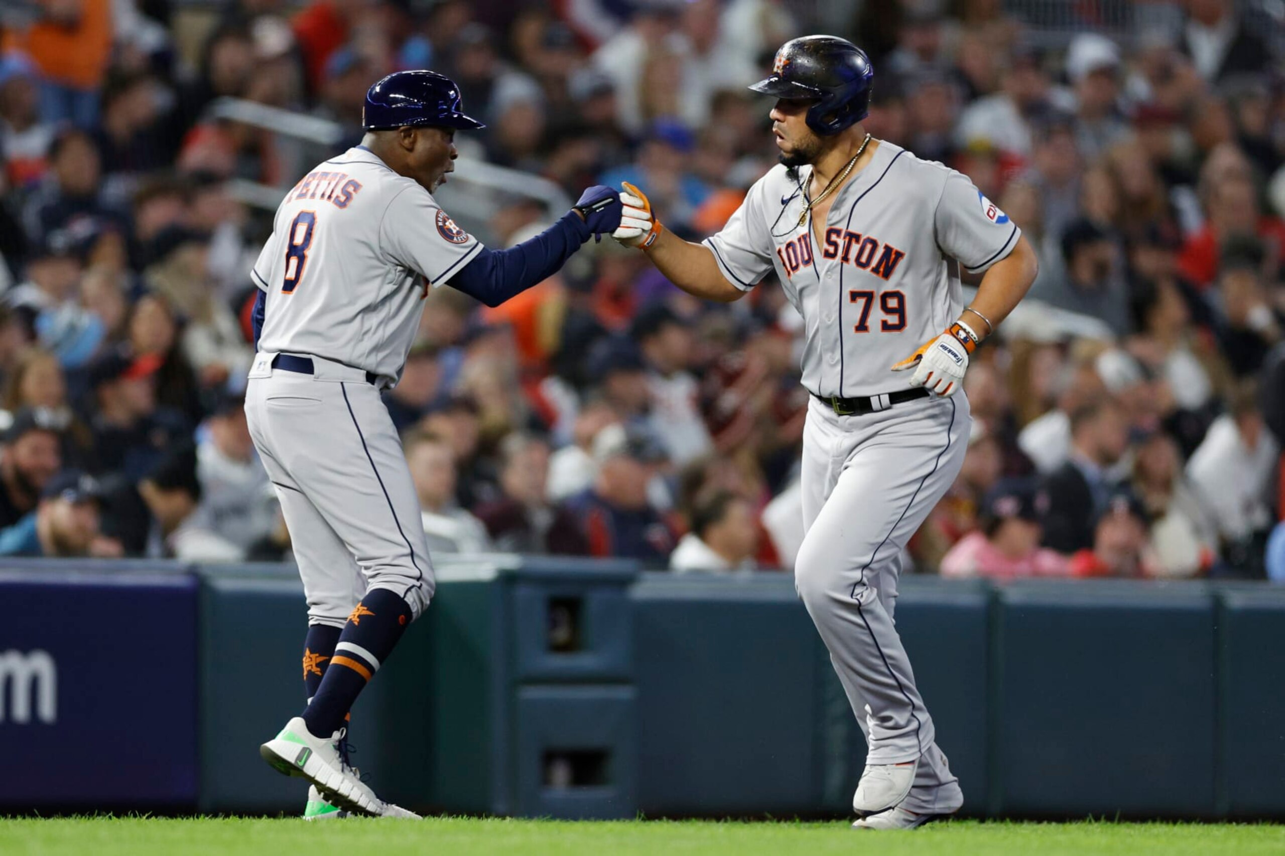 MINNEAPOLIS, MINNESOTA - OCTOBER 11: Jose Abreu #79 of the Houston Astros celebrates his two-run home run against the Minnesota Twins with Gary Pettis #8 during the fourth inning in Game Four of the Division Series at Target Field on October 11, 2023 in Minneapolis, Minnesota. (Photo by David Berding/Getty Images)