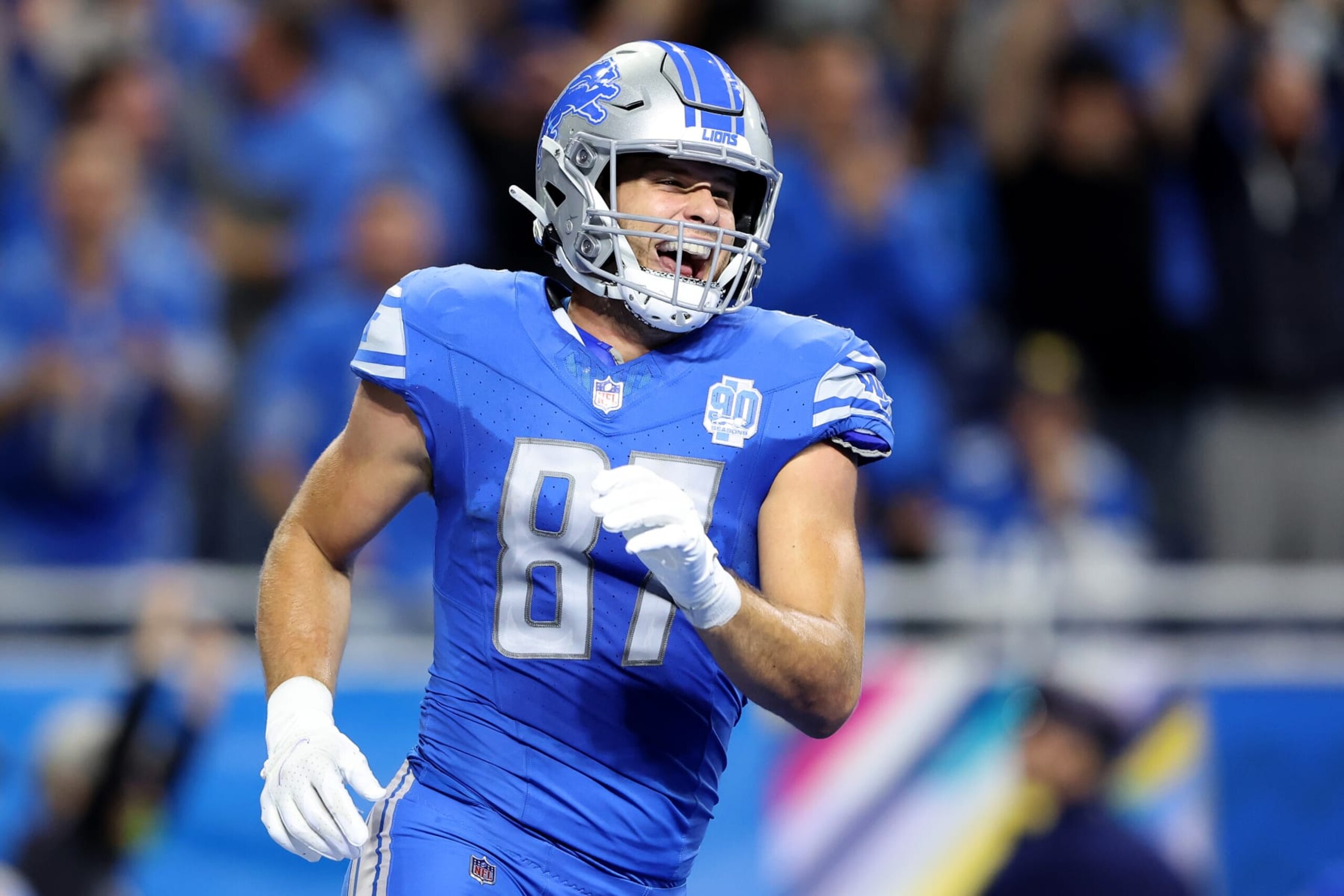 DETROIT, MICHIGAN - OCTOBER 08: Sam LaPorta #87 of the Detroit Lions celebrates after scoring a touchdown in the second quarter against the Carolina Panthers at Ford Field on October 08, 2023 in Detroit, Michigan. (Photo by Rey Del Rio/Getty Images)