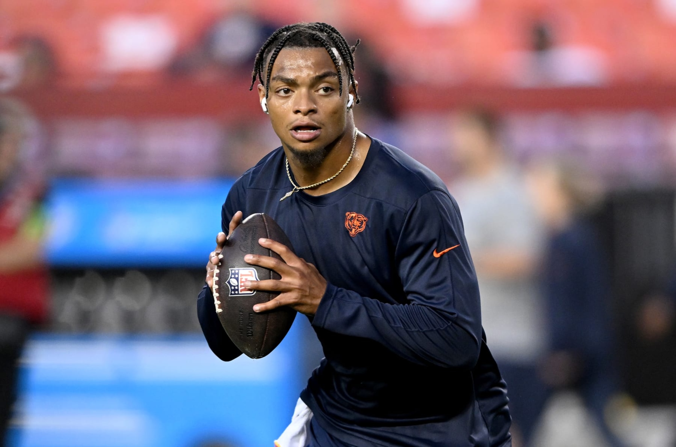 LANDOVER, MARYLAND - OCTOBER 05: Justin Fields #1 of the Chicago Bears warms up before the game against the Washington Commanders at FedExField on October 05, 2023 in Landover, Maryland. (Photo by G Fiume/Getty Images)