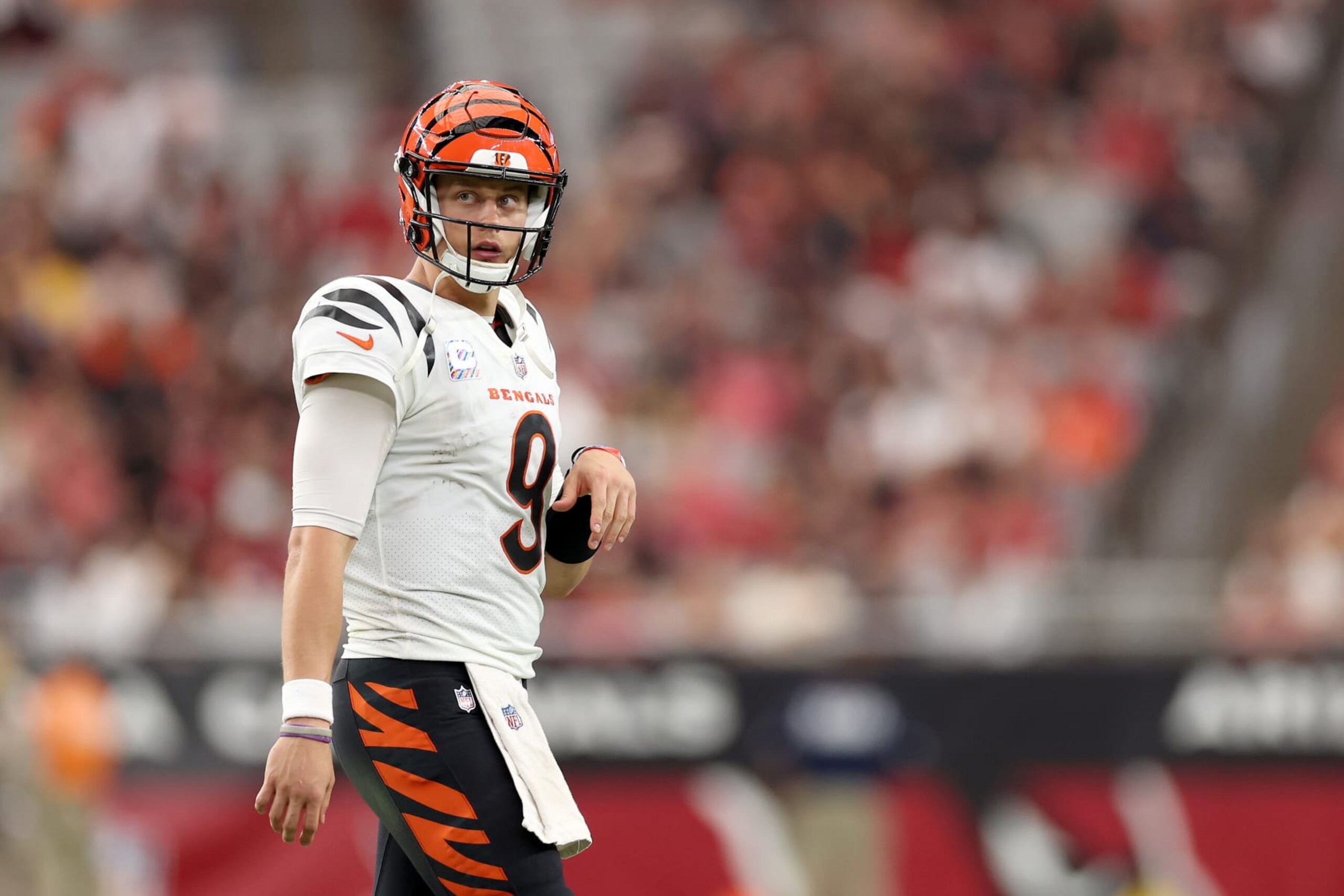 GLENDALE, ARIZONA - OCTOBER 08: Joe Burrow #9 of the Cincinnati Bengals looks on against the Arizona Cardinalsduring the second half at State Farm Stadium on October 08, 2023 in Glendale, Arizona. (Photo by Christian Petersen/Getty Images)