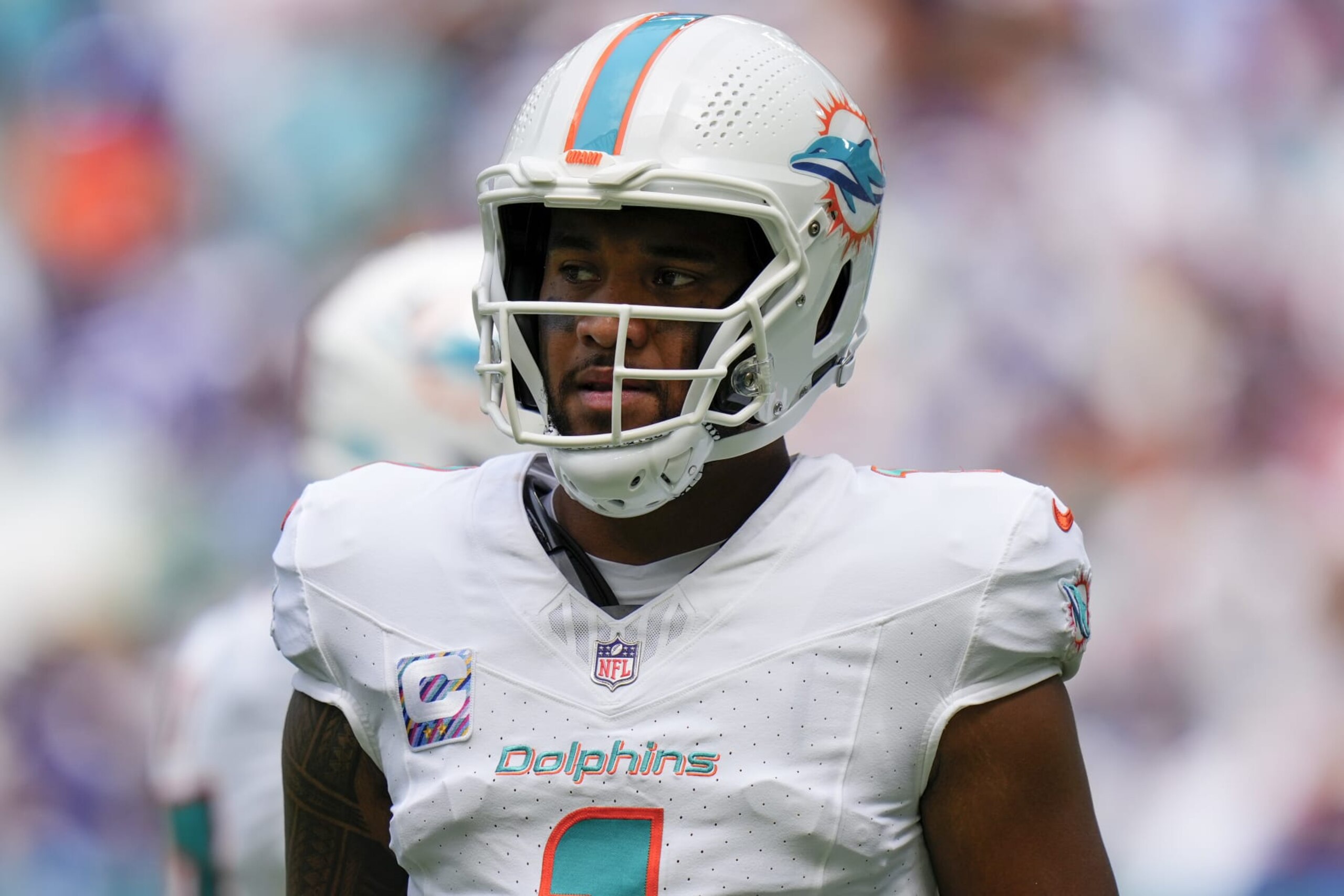 MIAMI GARDENS, FLORIDA - OCTOBER 08: Tua Tagovailoa #1 of the Miami Dolphins looks to the sidelines against the New York Giants during the first half at Hard Rock Stadium on October 08, 2023 in Miami Gardens, Florida. (Photo by Rich Storry/Getty Images)